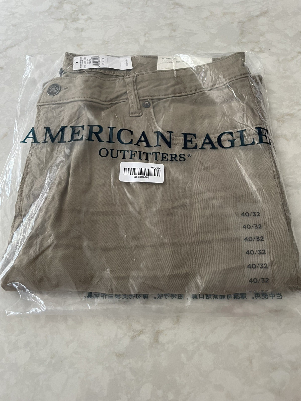 NWT American Eagle Men’s Slim Straight khaki Jean 40×32 extreme flex tan jeans