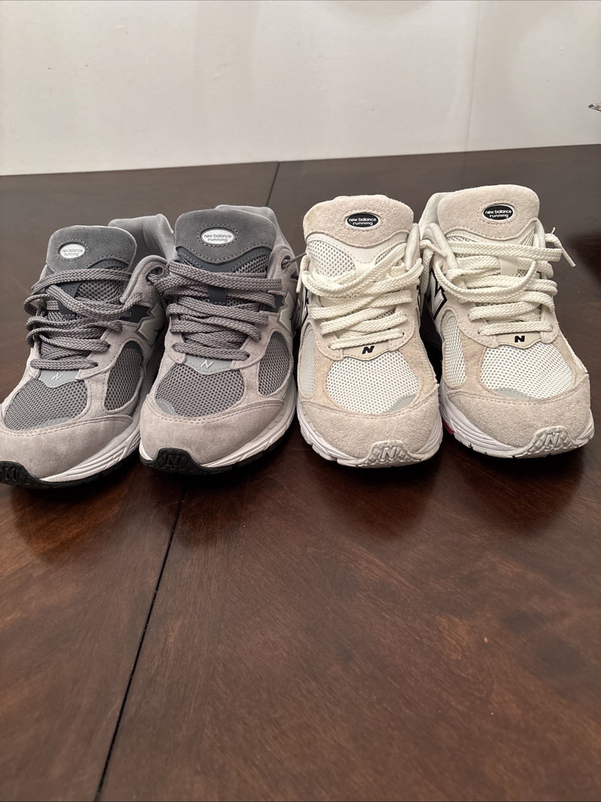 TWO pairs of New Balance 2002R. Men size 7.5/womens 9.