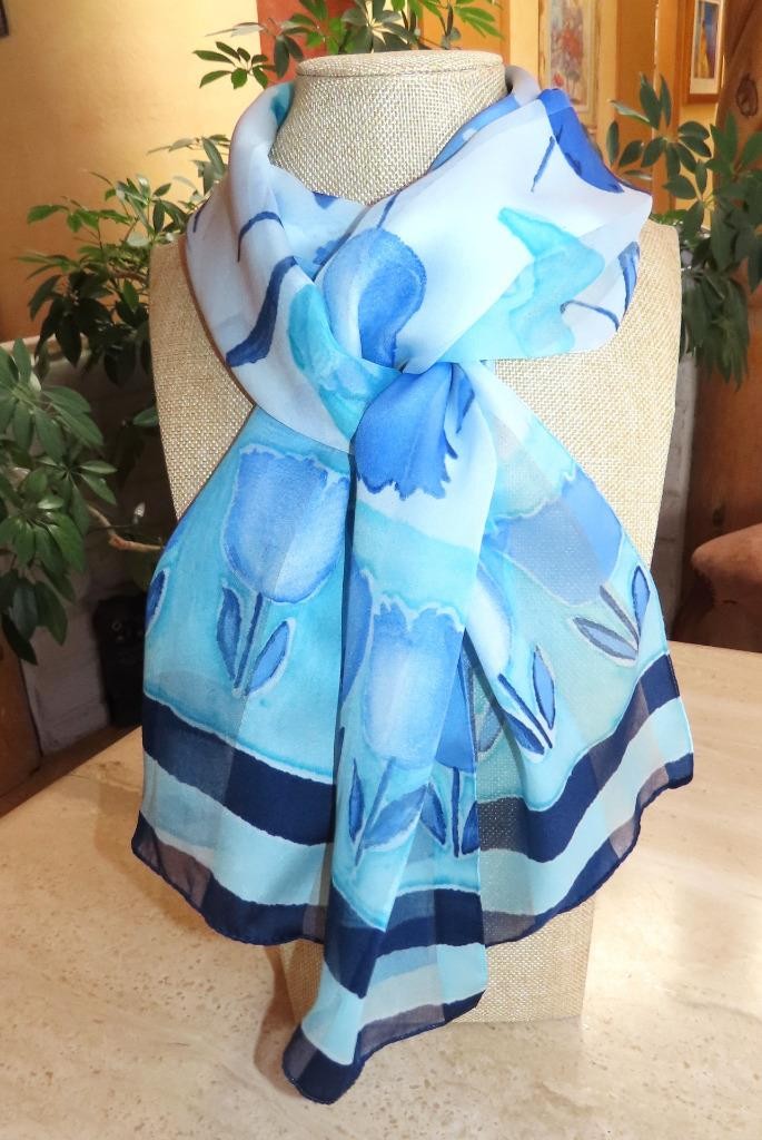 Oblong floral scarf; blue tones, white; 60×14.5 in. Semisheer; poly blend?