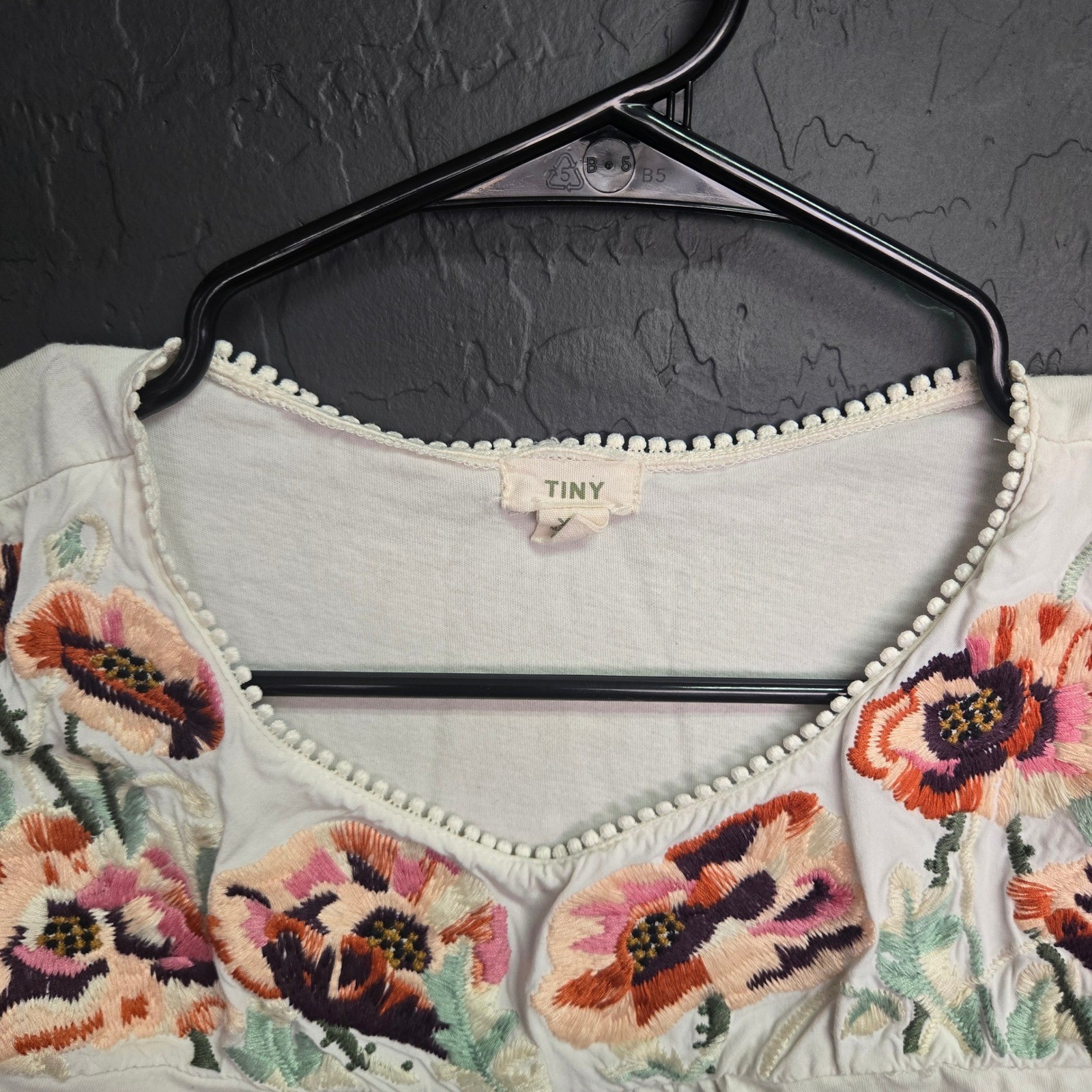 Anthropologie Tiny Ivory Floral Embroidered Pom Pom Trim Blouse XS Short Sleeve