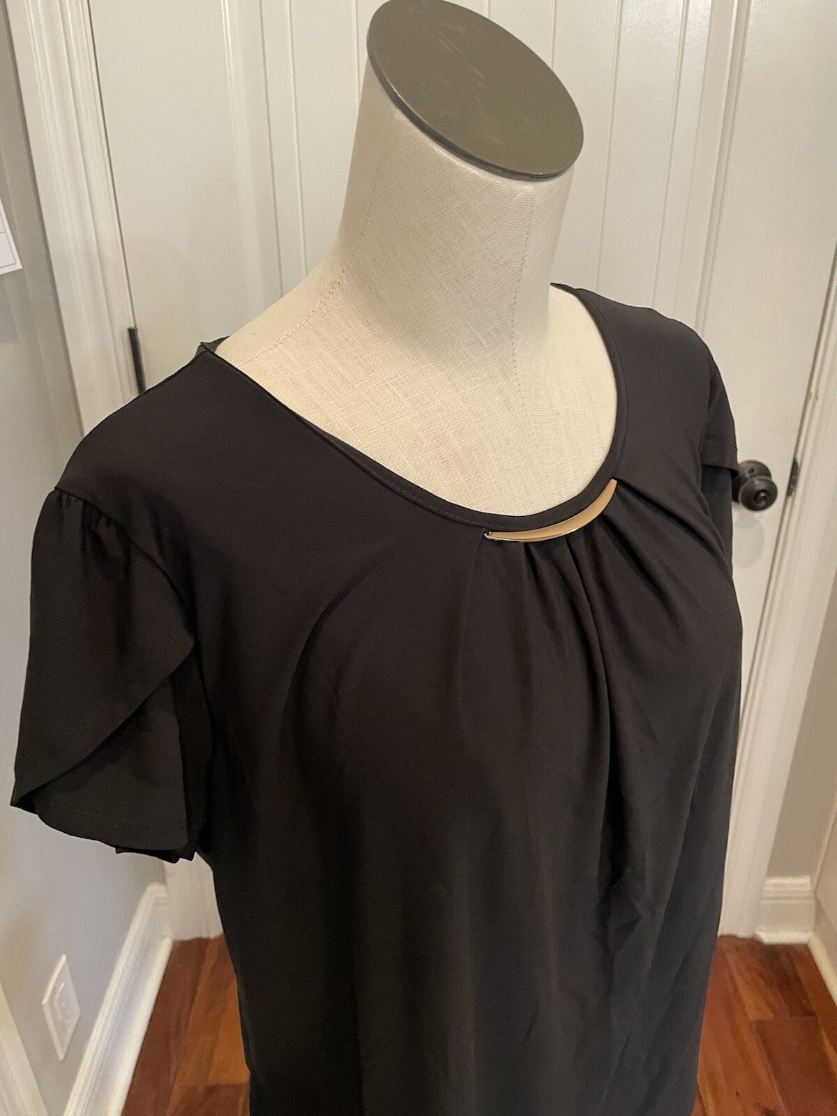 Black round neck cap sleeve blouse with gold Bar Detailing A.U.W. Women’s Large