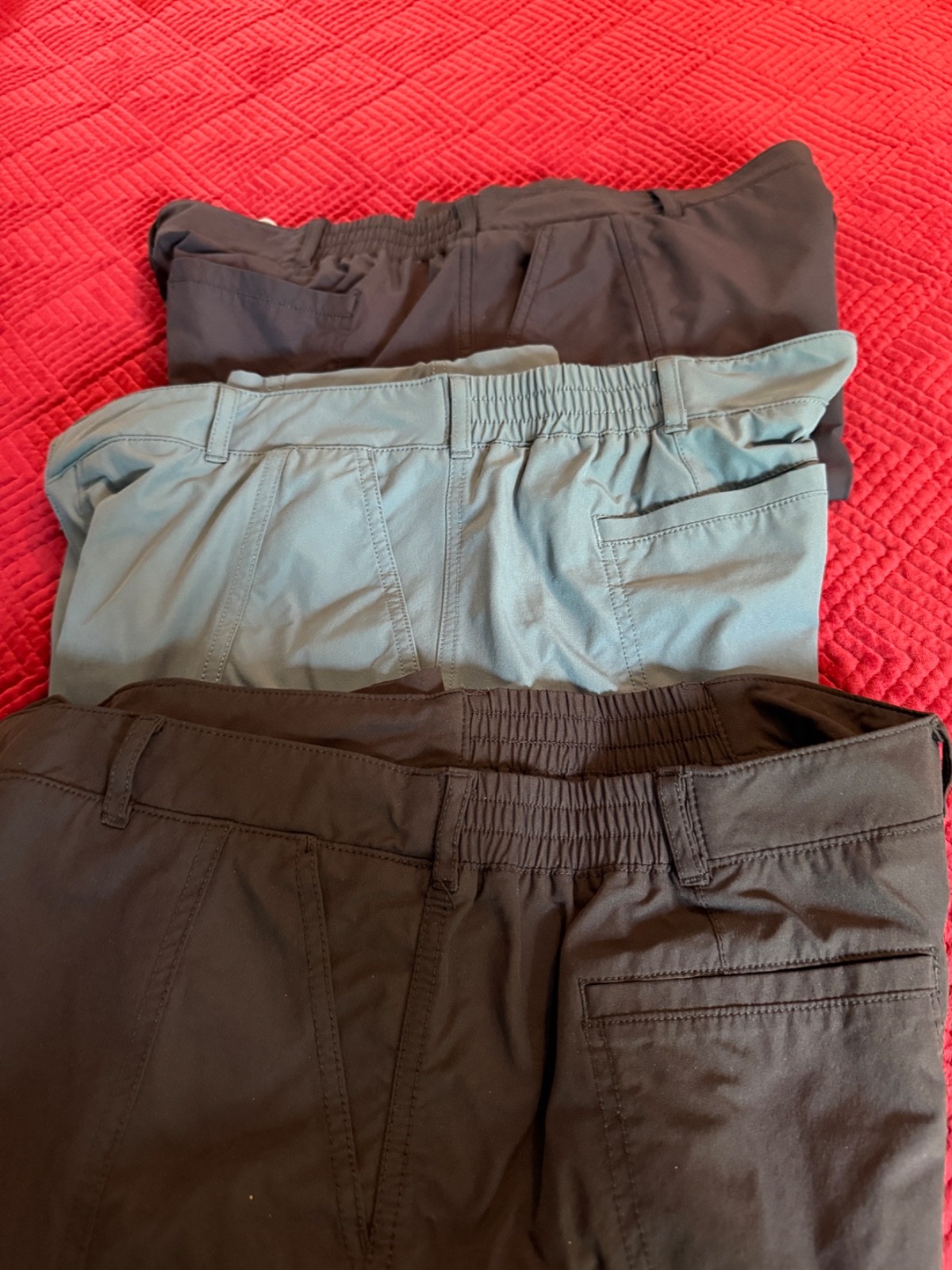 Kirkland Ladies Travel Pants. Three pair. Black, Medium blue, Navy size 12