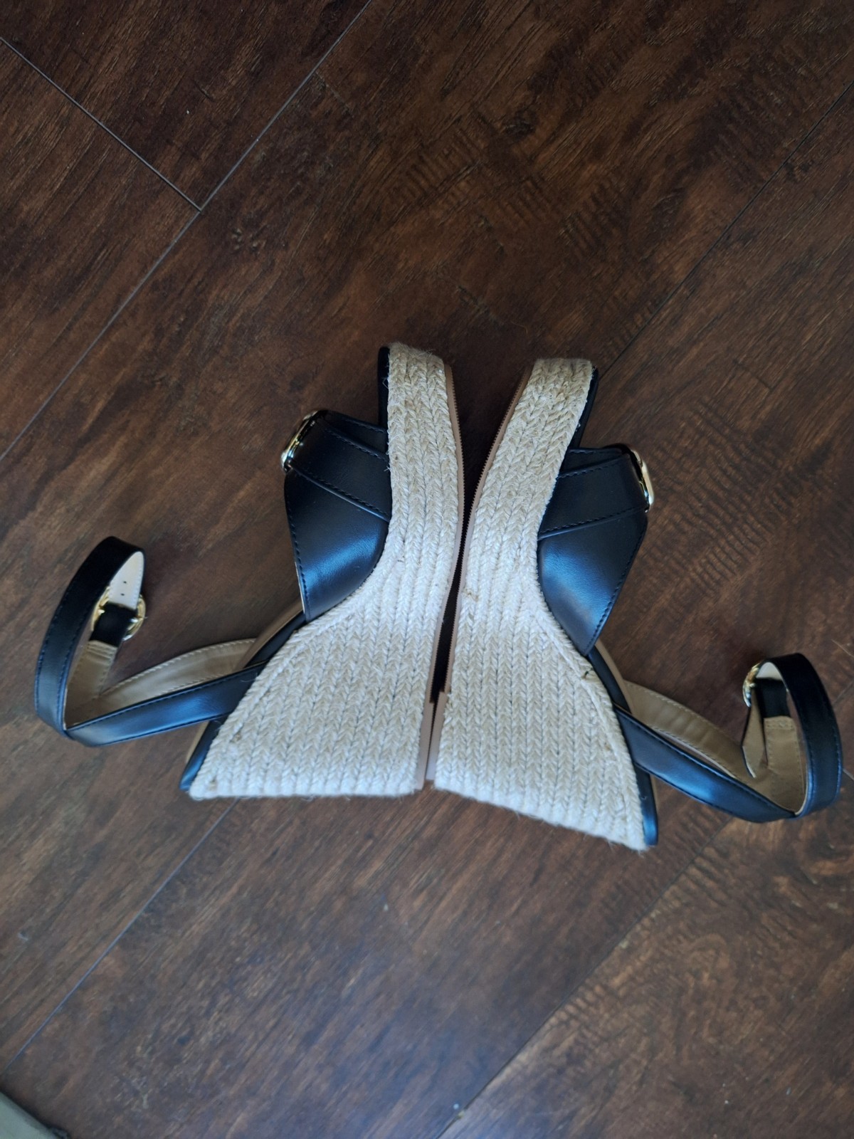 Soda brand ,black , 5 1/2 inch wedge, NEVER WORN , true to size, gold hardware.