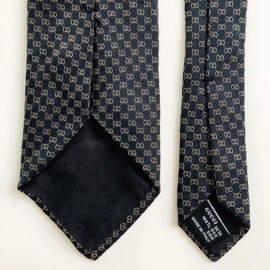 GUCCI Emblem Pattern Silk Tie Black Bronze 8.3cm Wide 154cm Long Pre-owned