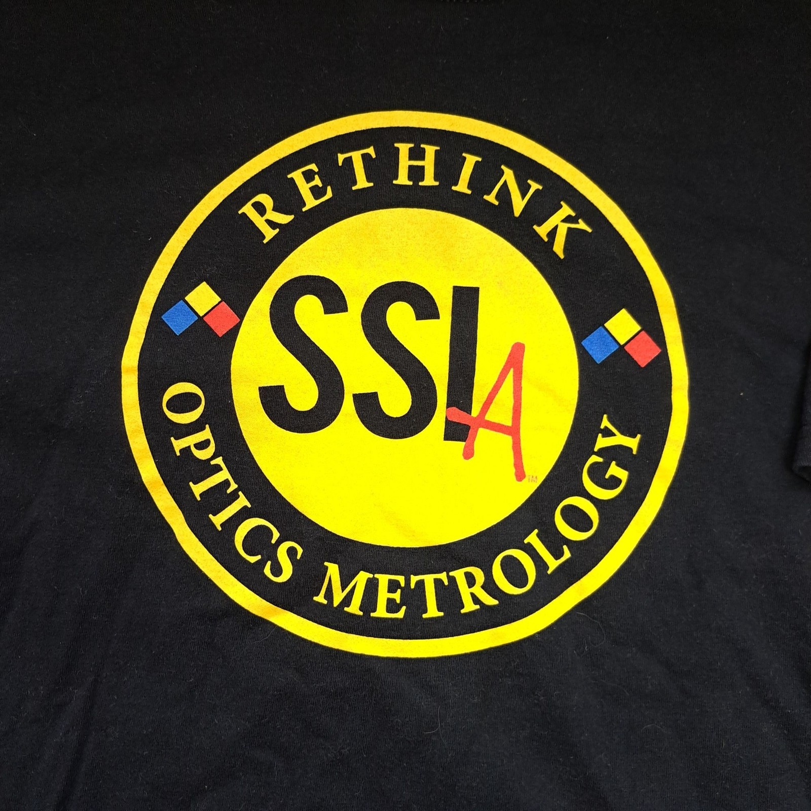 SSIA Rethink Optics Metrology TShirt Black Large Anvil QED Technologies Logo