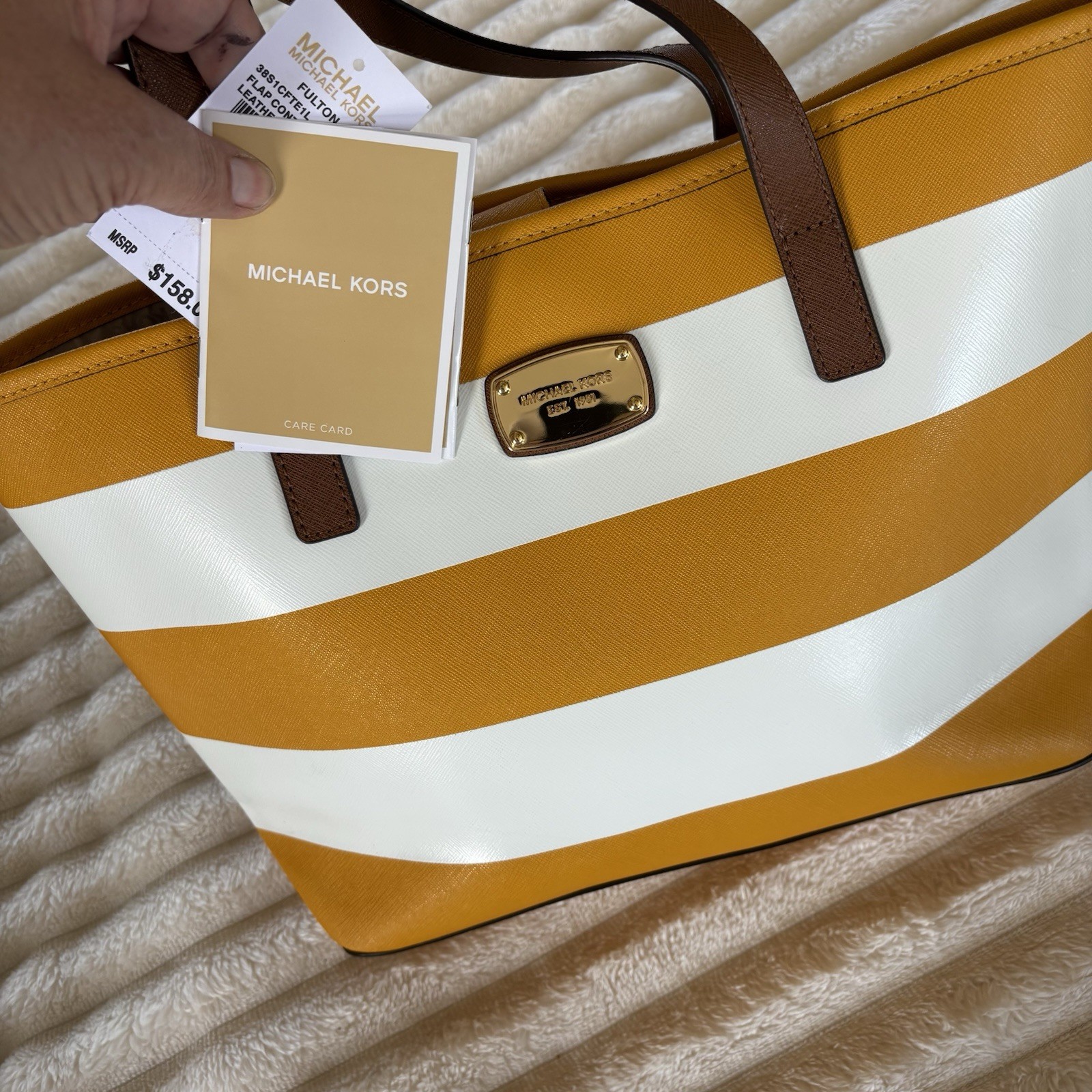 Michael Kors purse, Yellow And White Stripped, With Brown Straps.