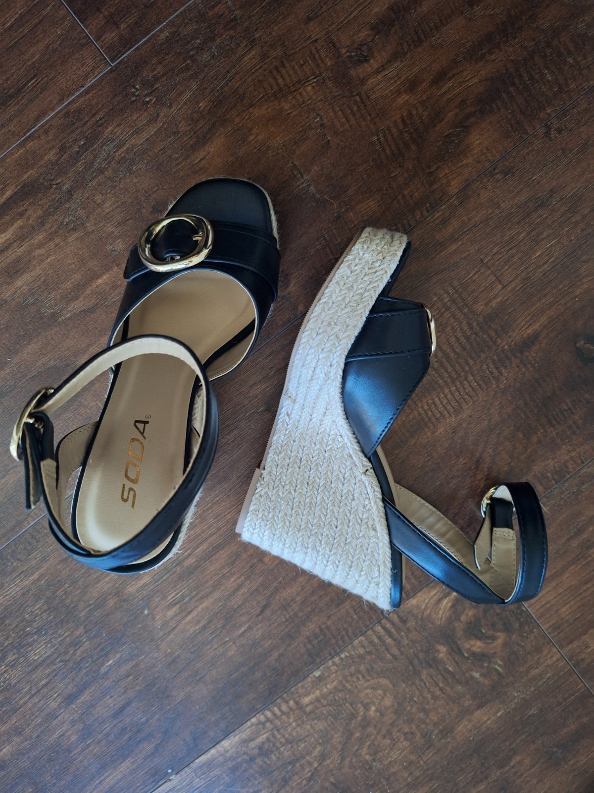 Soda brand ,black , 5 1/2 inch wedge, NEVER WORN , true to size, gold hardware.