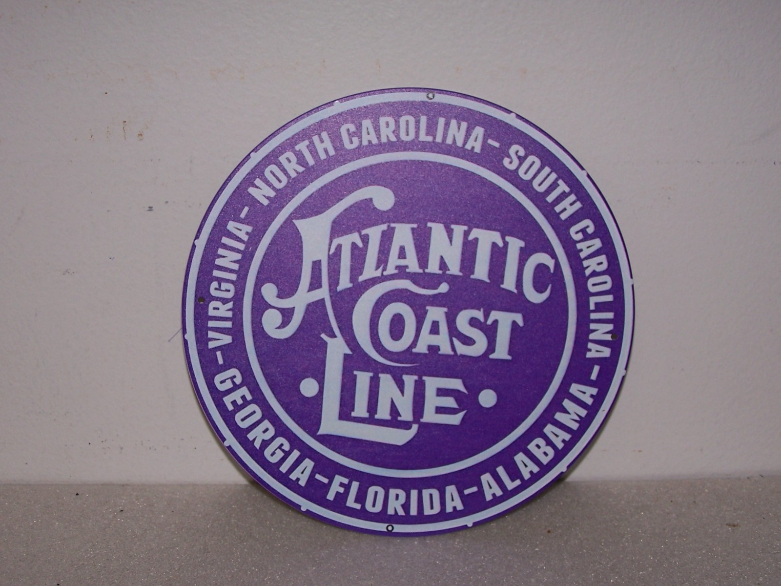 7.75″ tin placard, Atlantic Coast Line RR, purple background