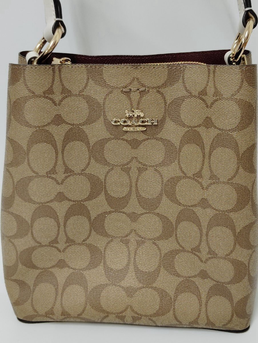 Coach Authentic Signature Small Town Bucket Bag Elevate your everyday style