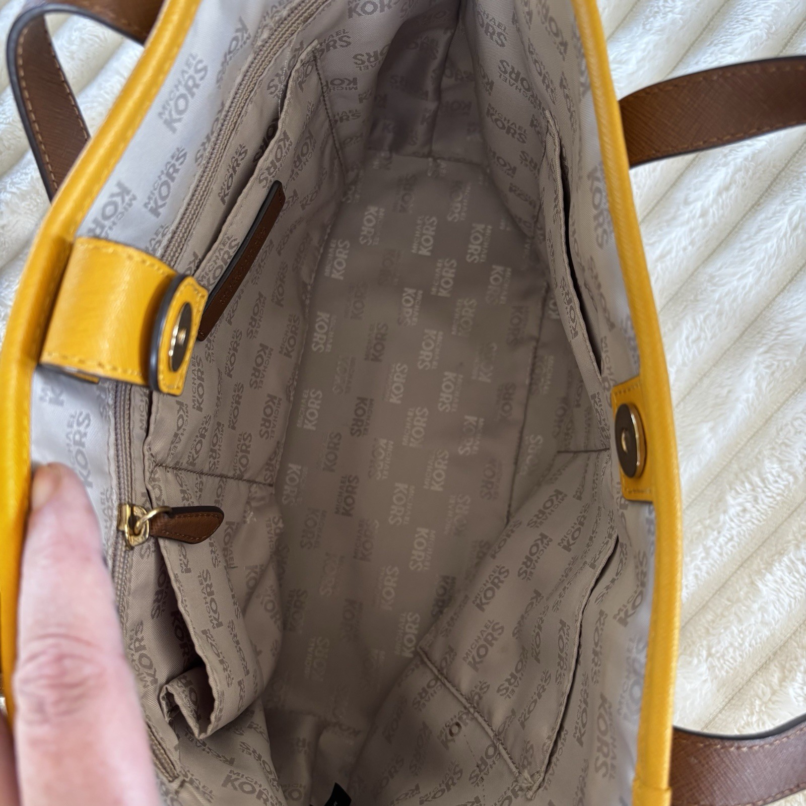 Michael Kors purse, Yellow And White Stripped, With Brown Straps.