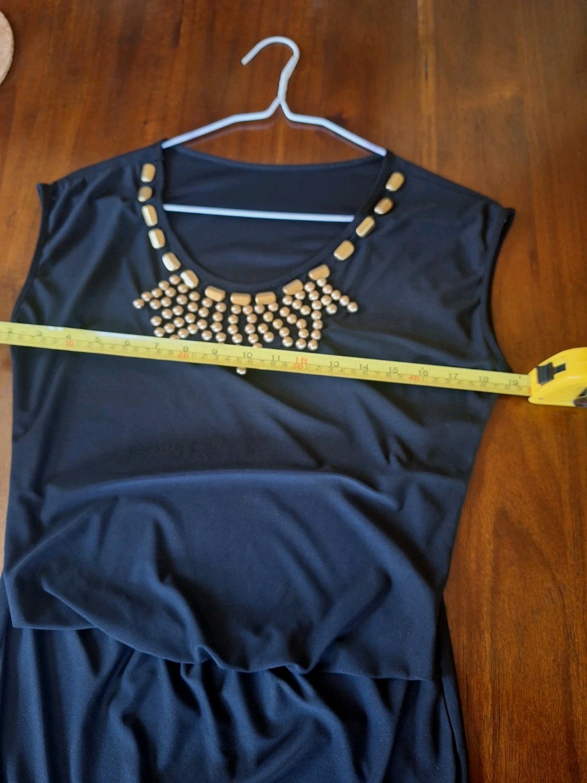 Black Blouse With Gold Beaned Necklace