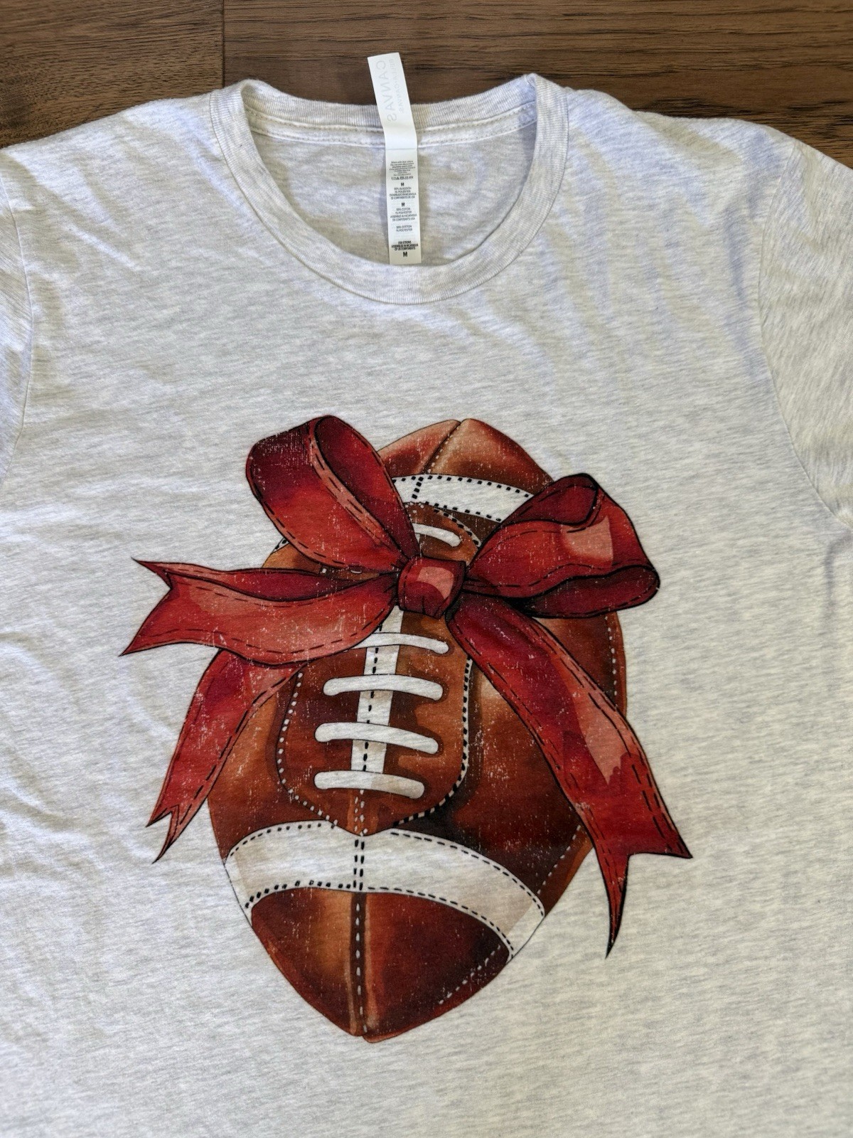 Bella + Canvas Women’s M Gray Short Sleeve Football Graphic T-Shirt