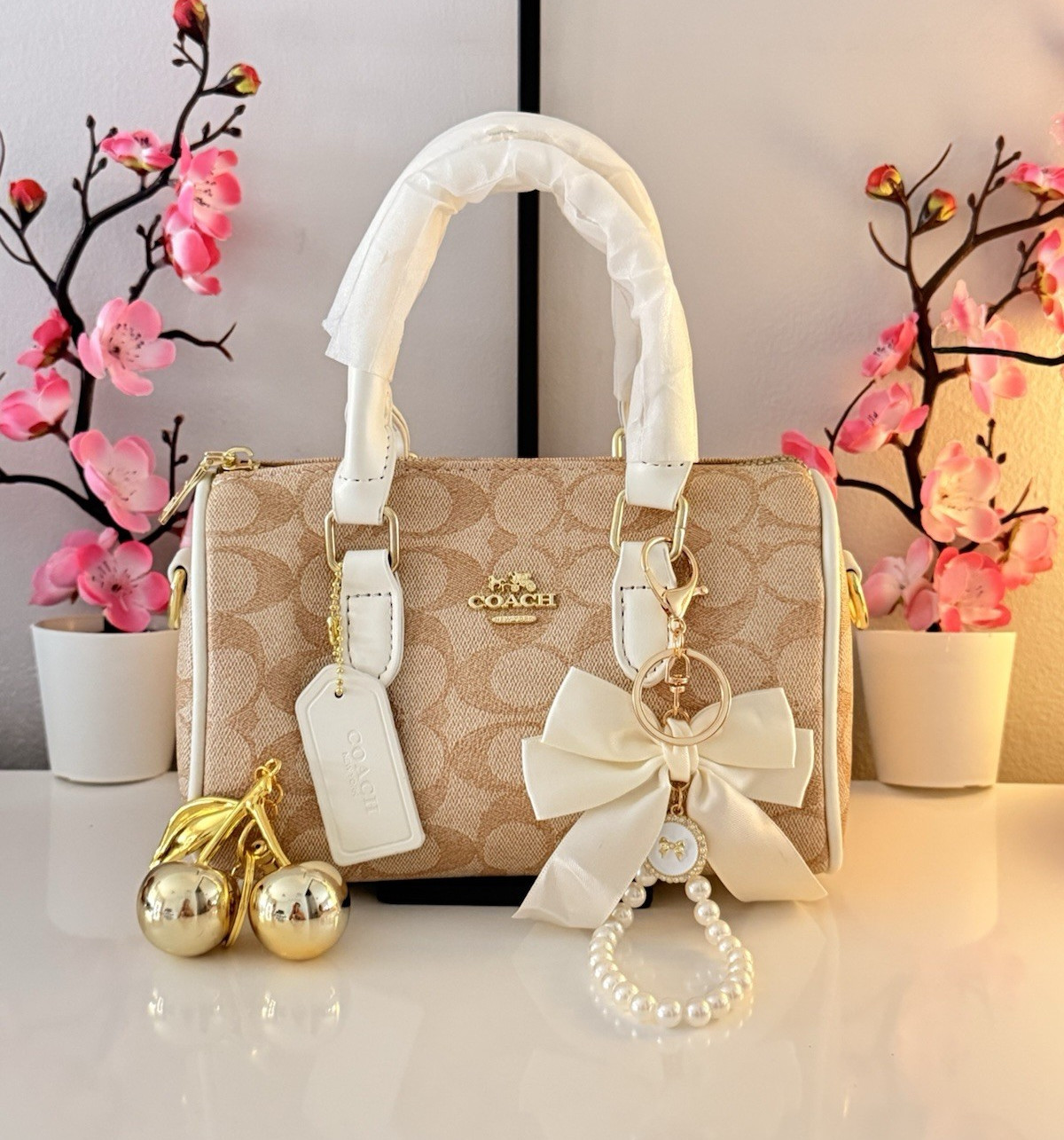 Coach Beige White Signature Logo Satchel Top Handle Bag Zip Gold Bow Charm