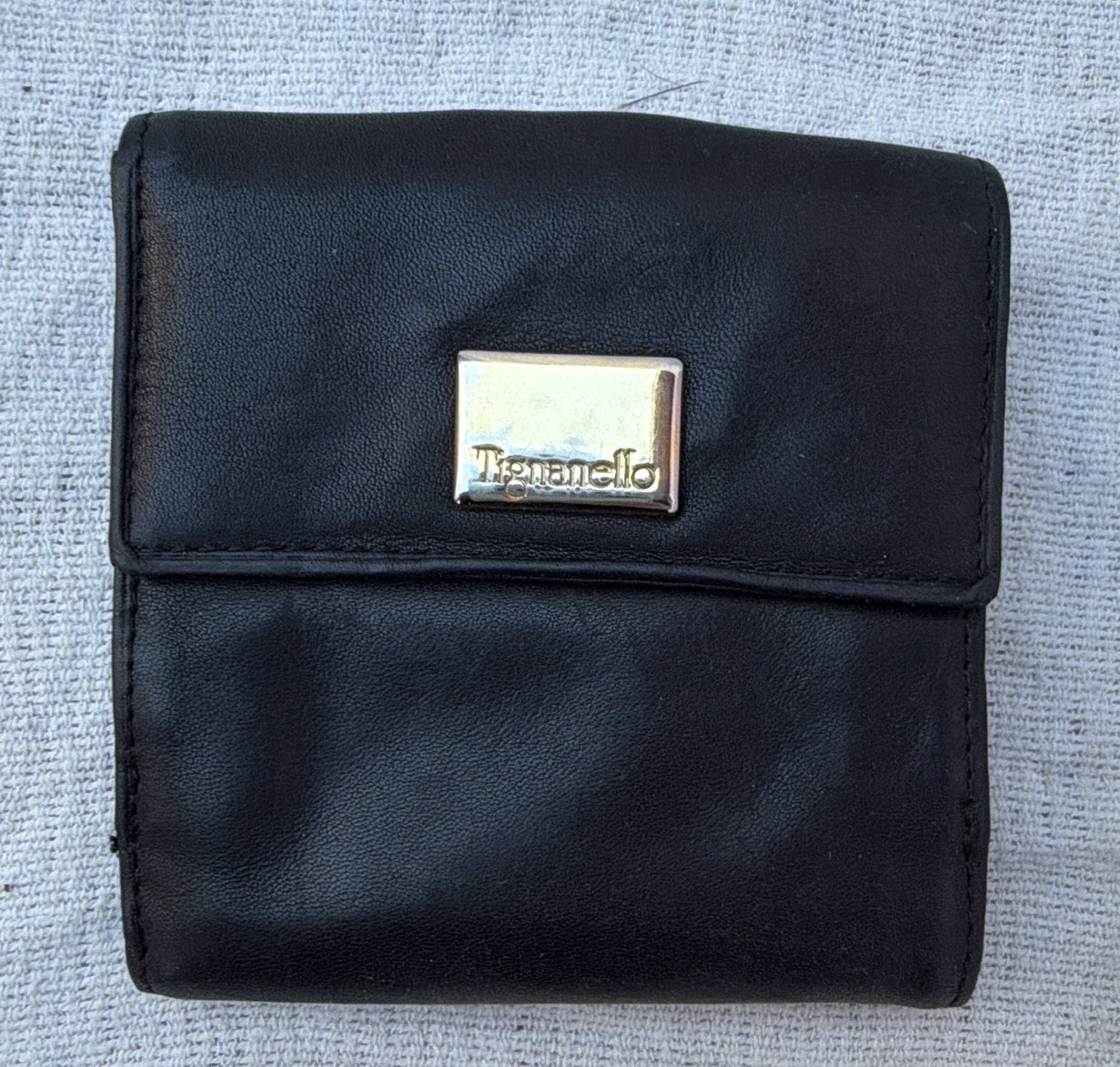 Tignanello Women’s Black Bifold Snap Wallet with Logo, ID Window, Card Slots