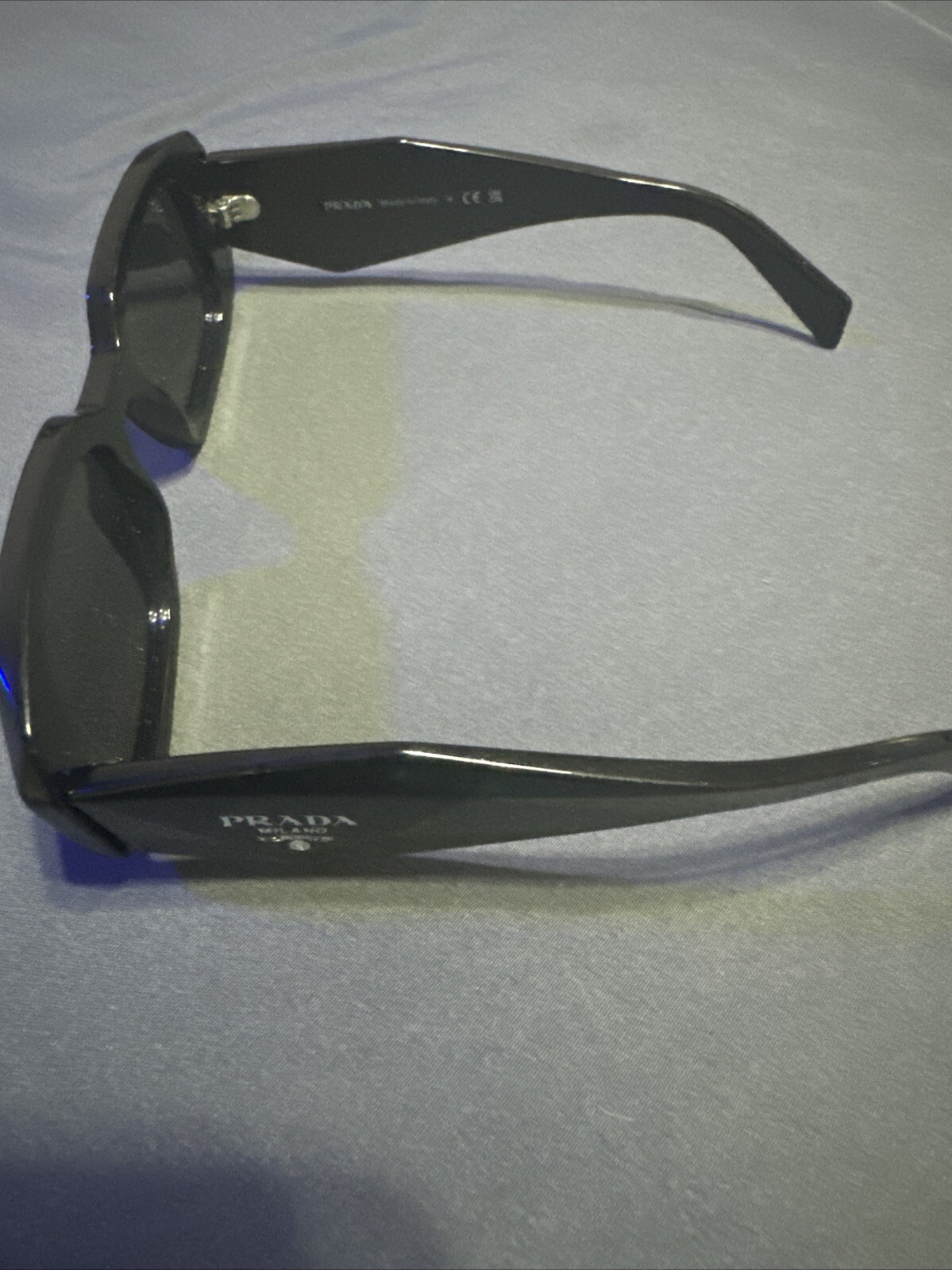 PRADA PR 27ZS Men’s Irregular Sunglasses – Black/Gray (PR 27ZS 16K08Z 54)