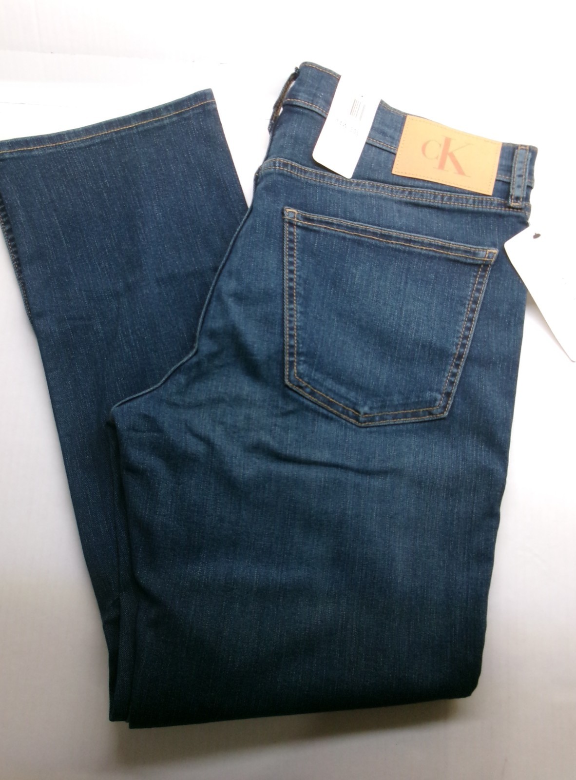 Calvin Klein Straight Leg Jeans sits below waist easy fit hip & thigh Dark Wash