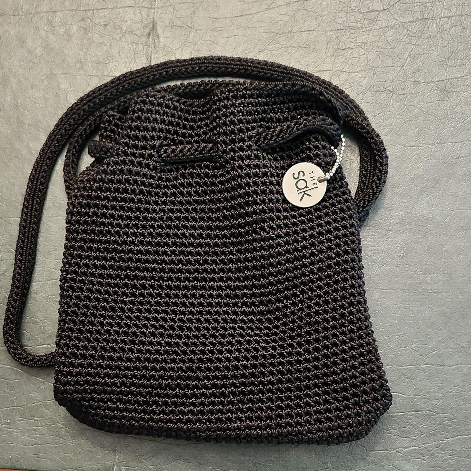 The Sak Women’s Black Solid Shoulder Bag Zip Top Lined Pockets Silver Charm