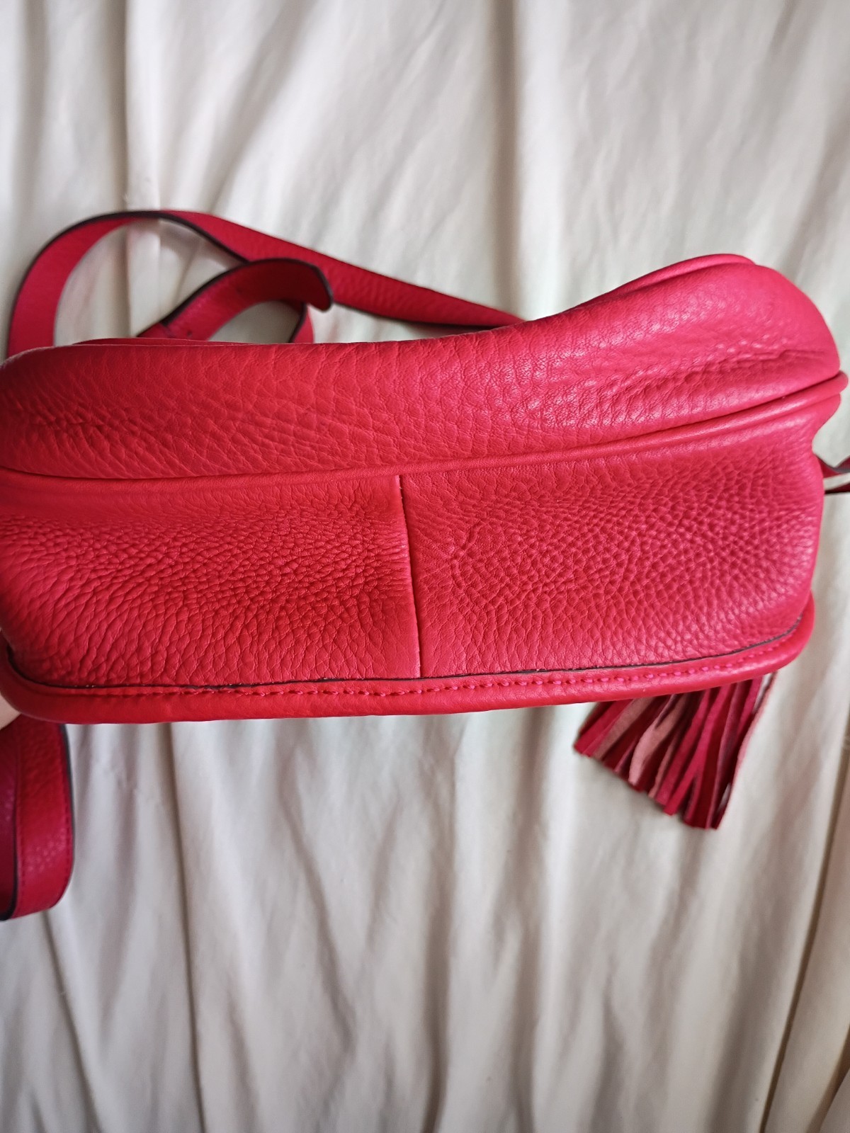 Authentic Isaac Mizrahi Red Pebbled Leather Crossbody Saddle Bag with Tassel