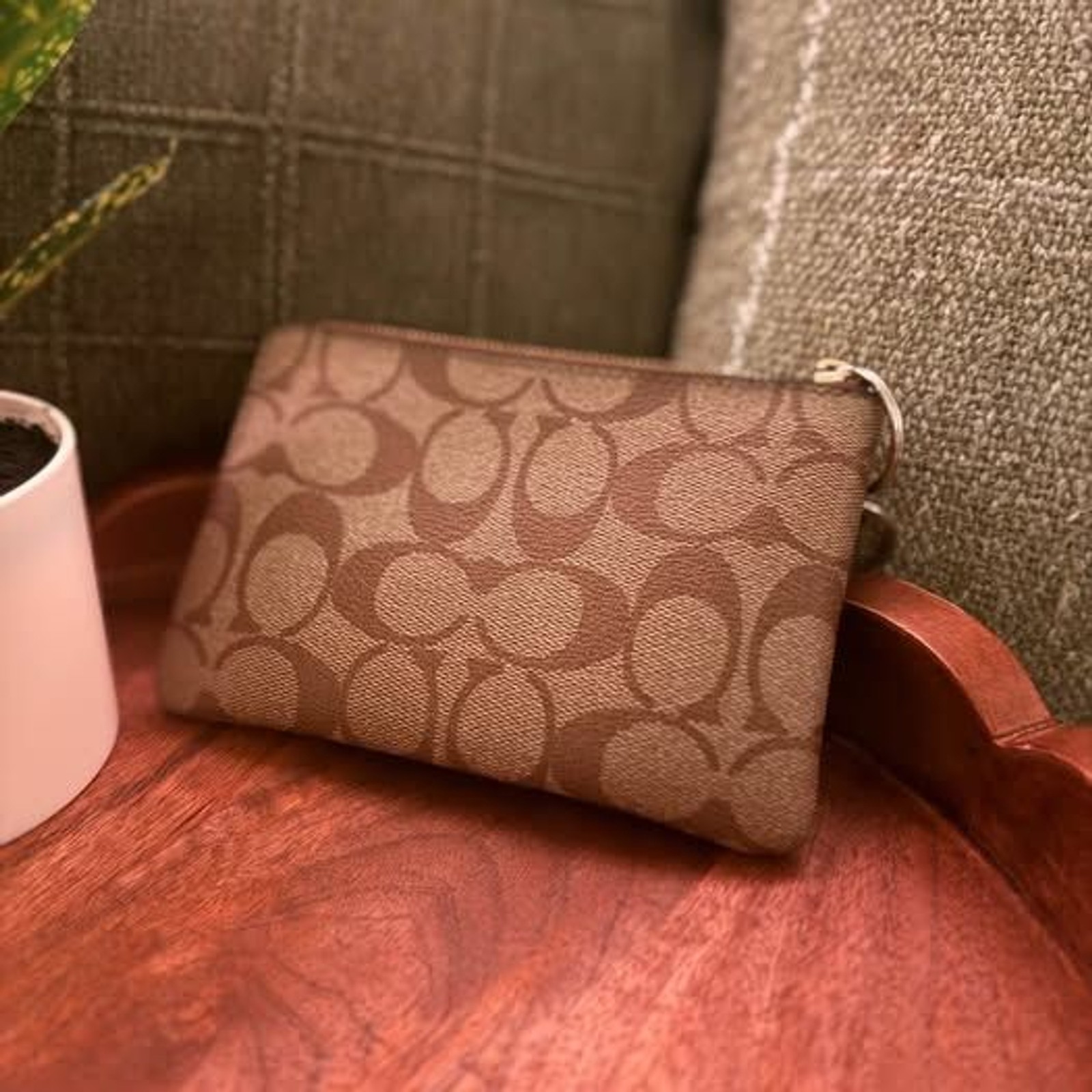 Coach wristlet with black accents