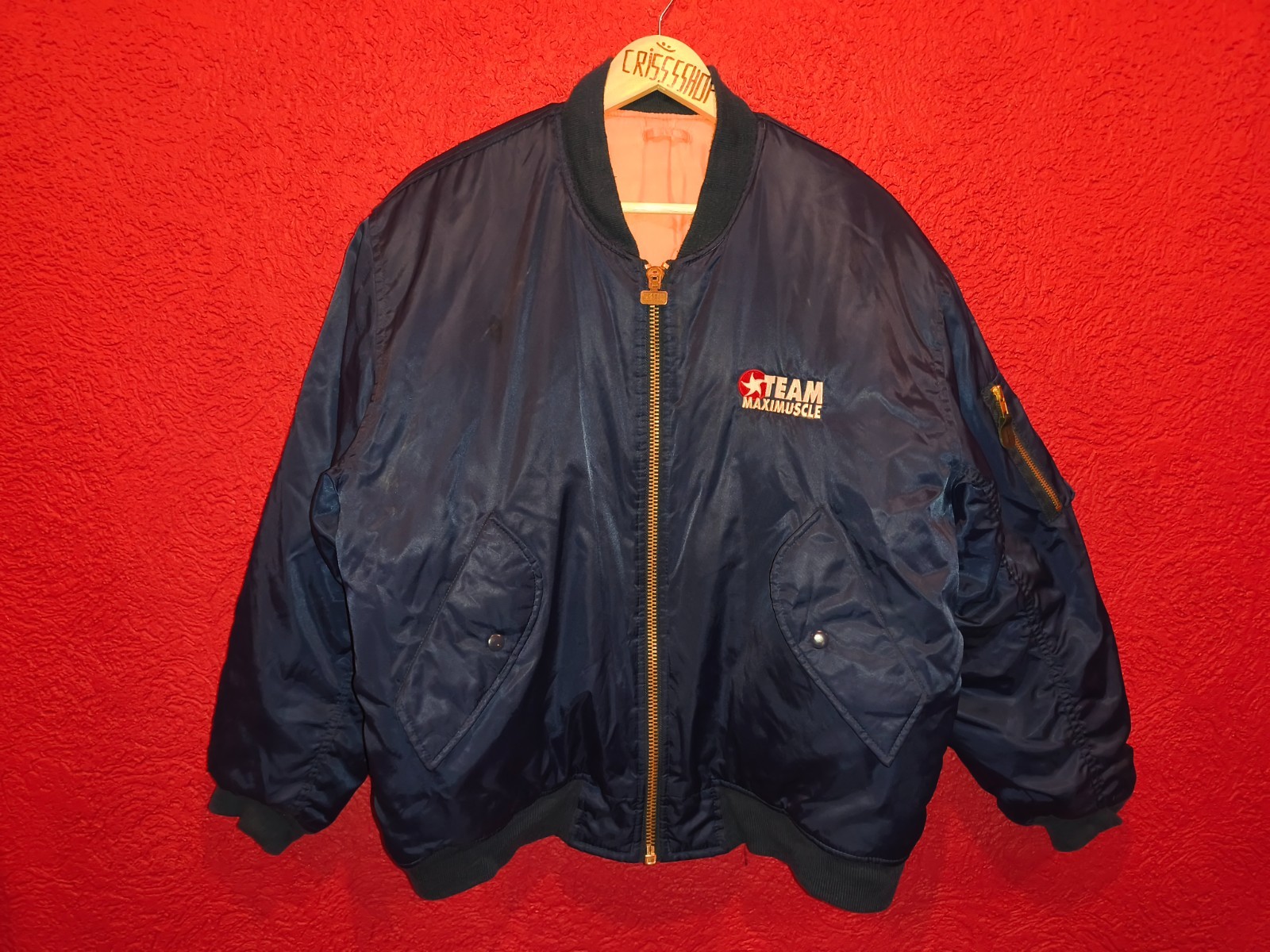 Classic 90s/Y2K bomber jacket featuring bold “Team Maximuscle” chest & back embr