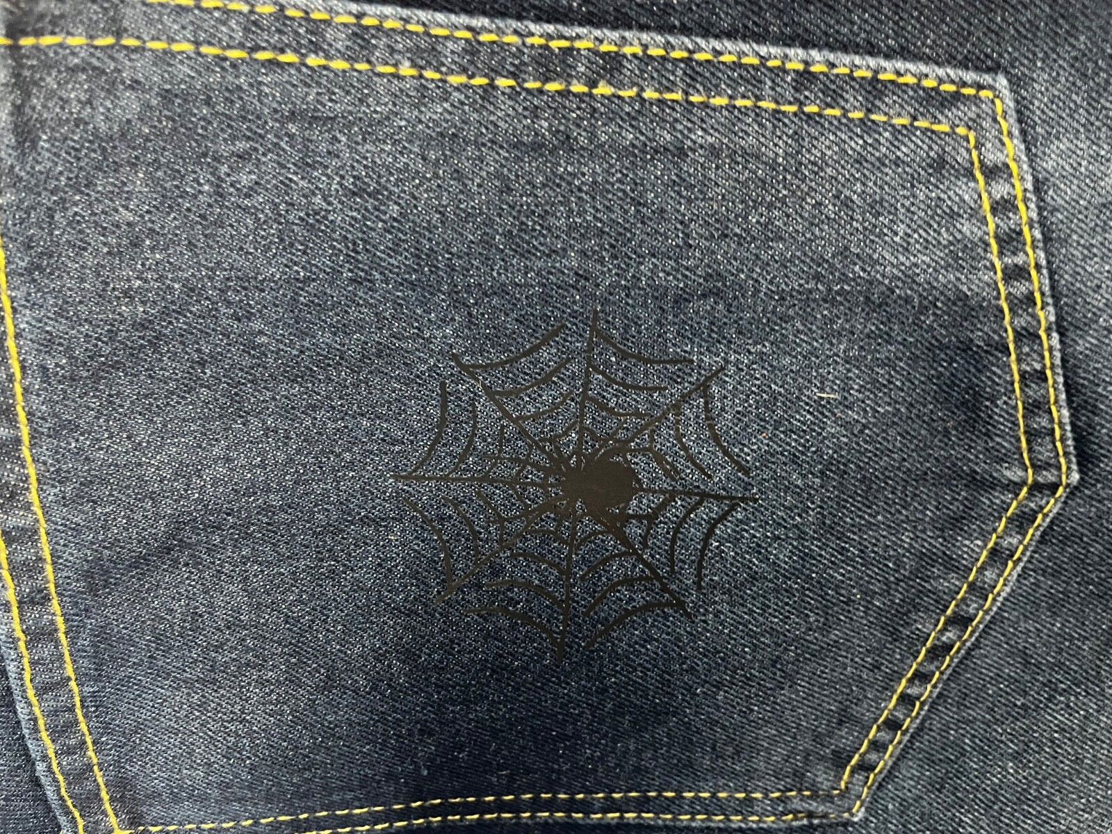 VYLLAN spyder jeans check description