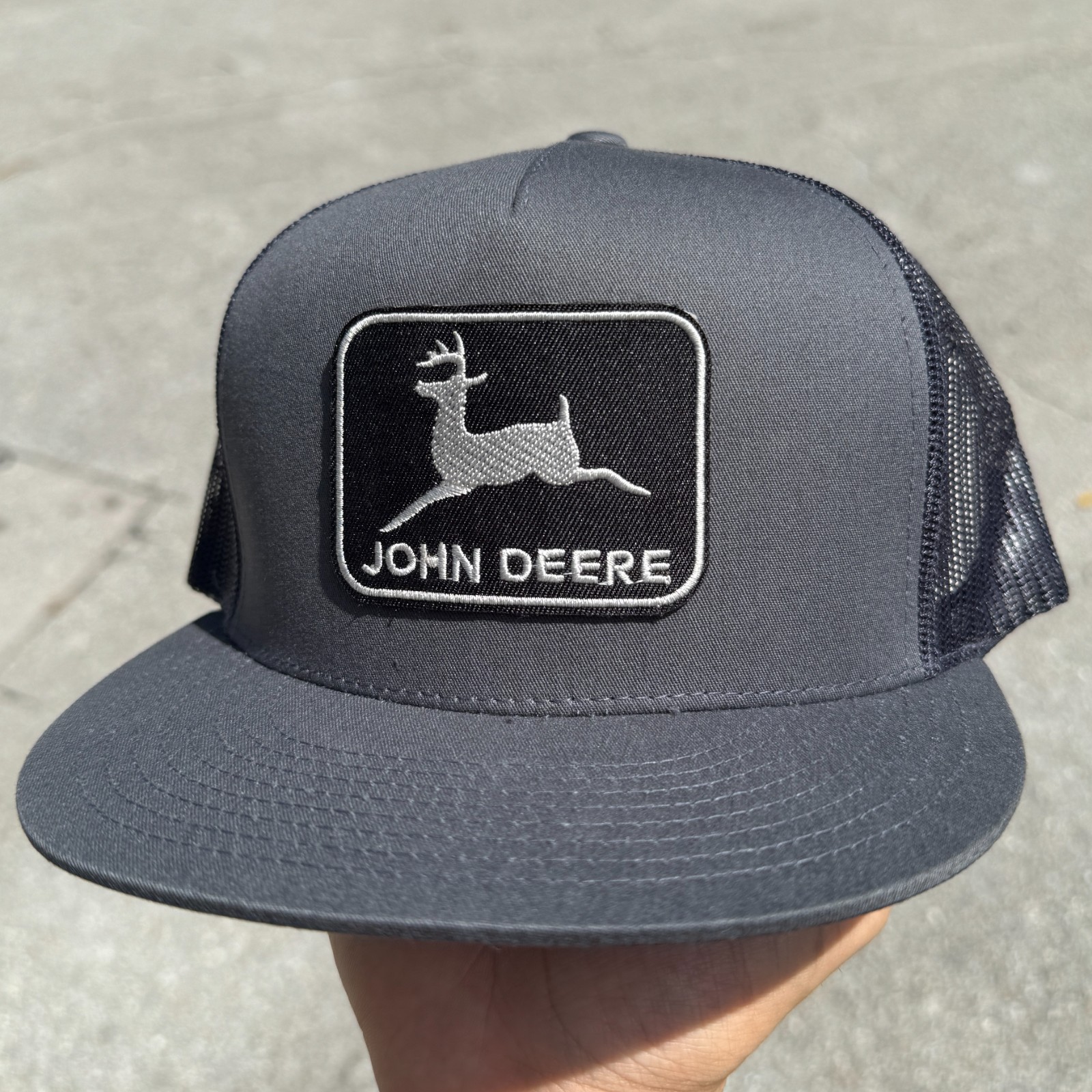 John Deere Black Patch on Yupoong Trucker Hat / YP Classic 6006 Snapback Cap