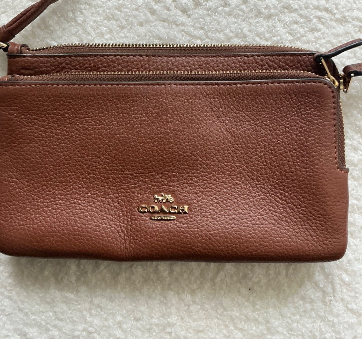 Coach wristlet/chestnut brown/light use