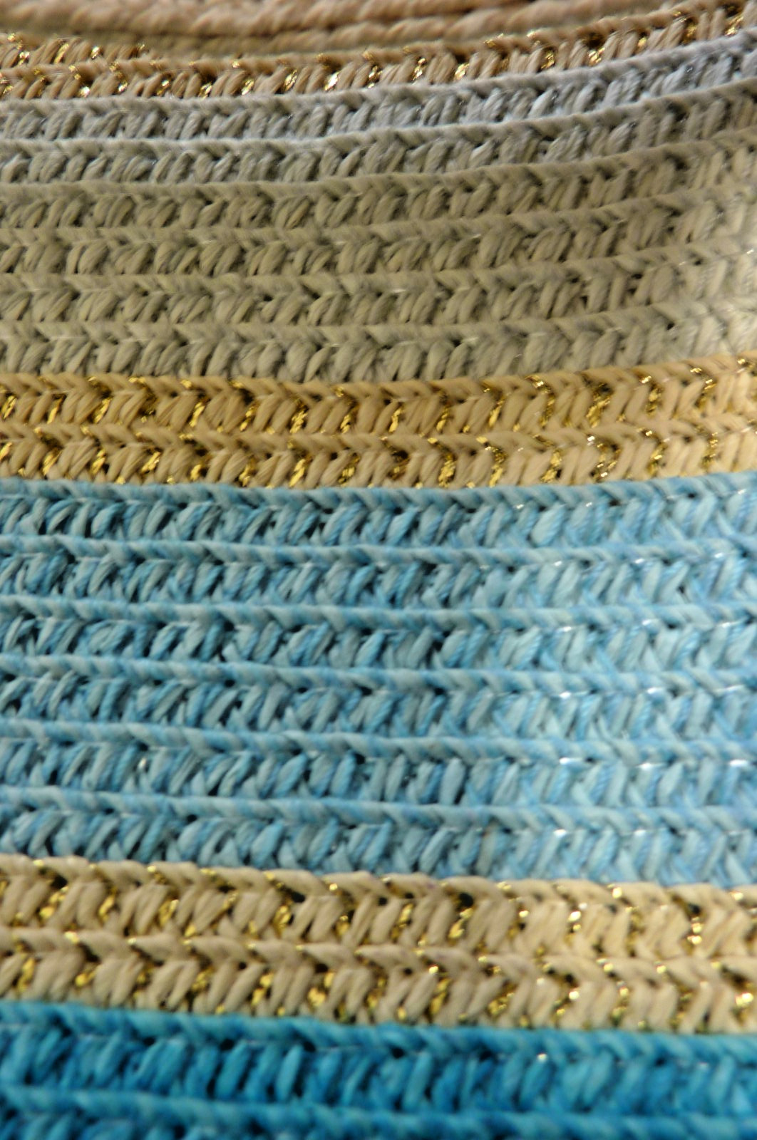 Cool-tone stripe straw chain tote size 15x8x6 inches.