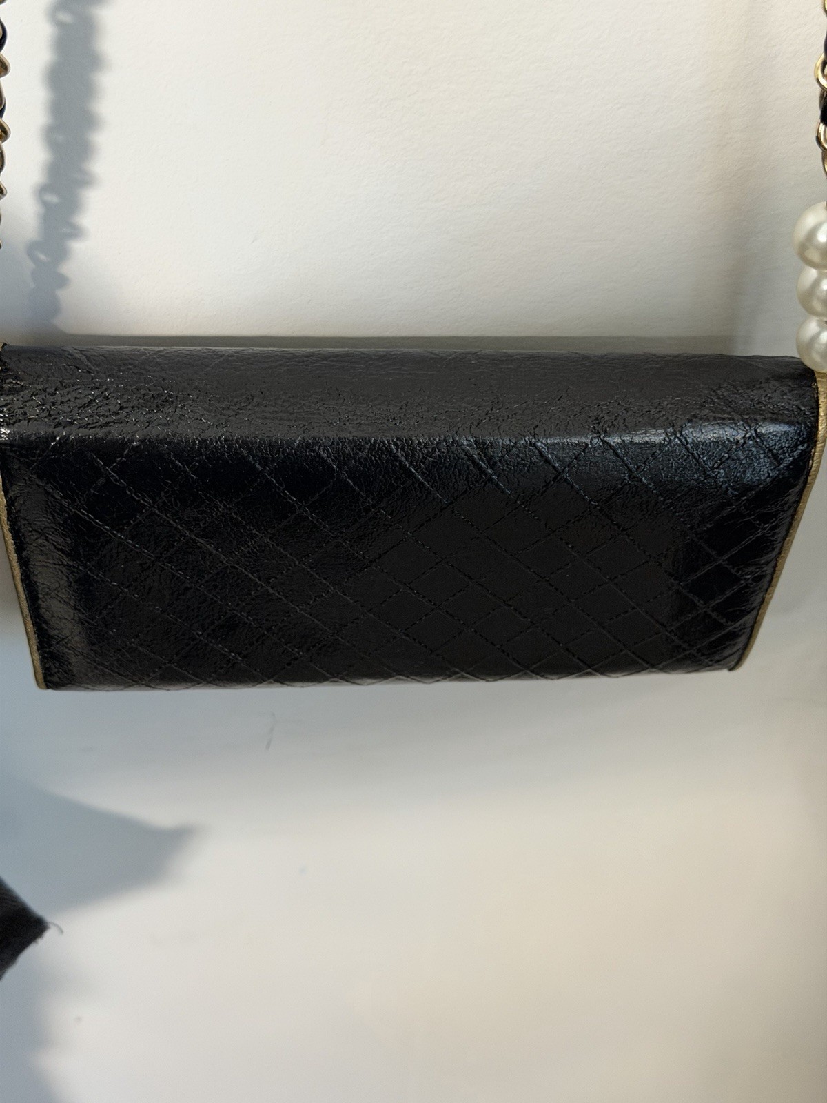 CHANEL Black Quilted Flap WOC Gold Hardware Chain Strap Pearl Accents