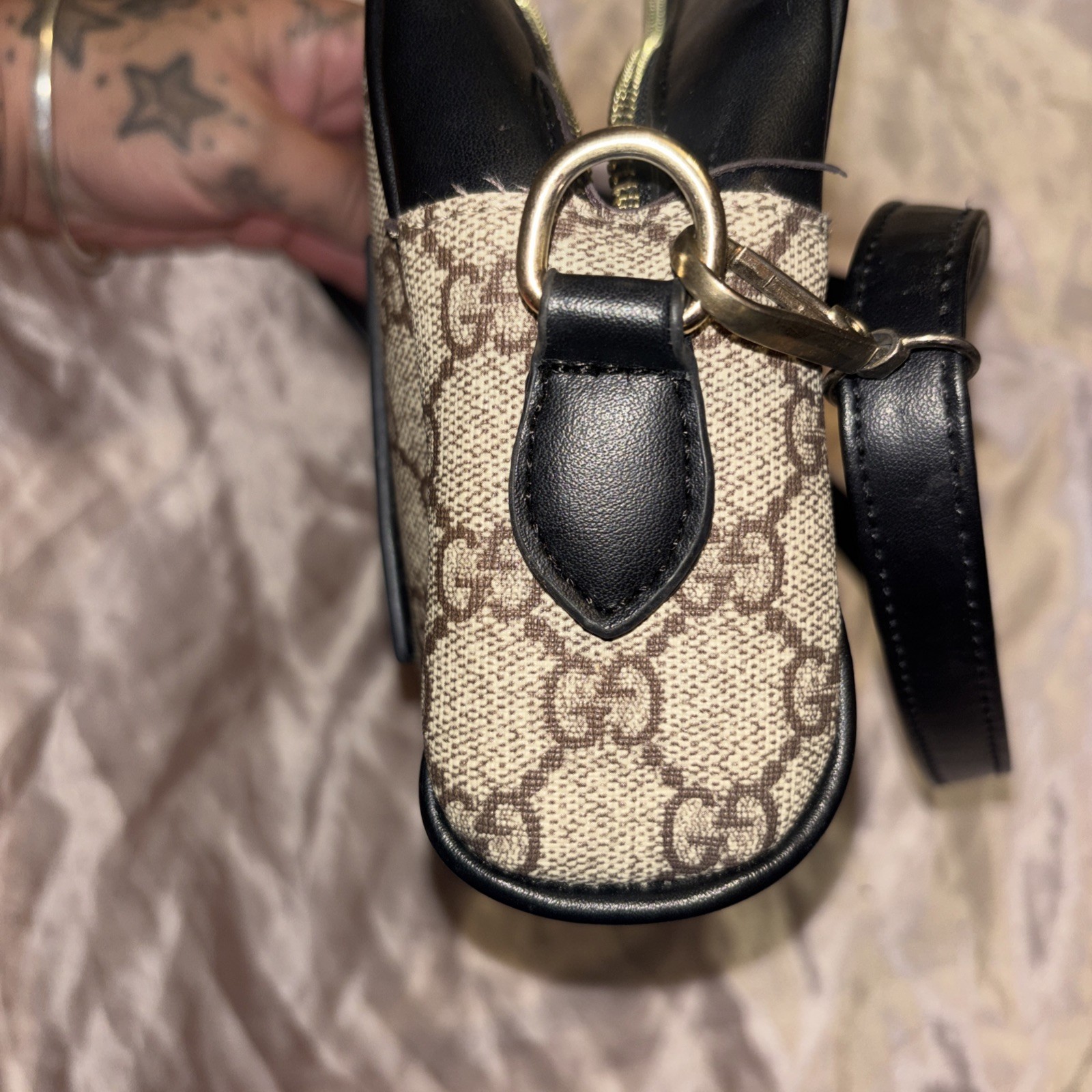 This is a Gucci GG Supreme Ophidia camera-style shoulder bag.