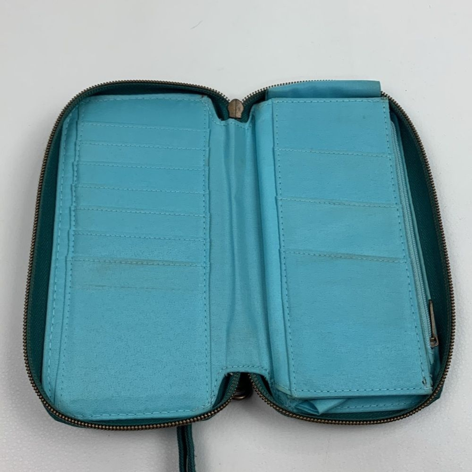 Travelon Dark Teal Green Clutch Wristlet wallet & brass Accents Zip around strap