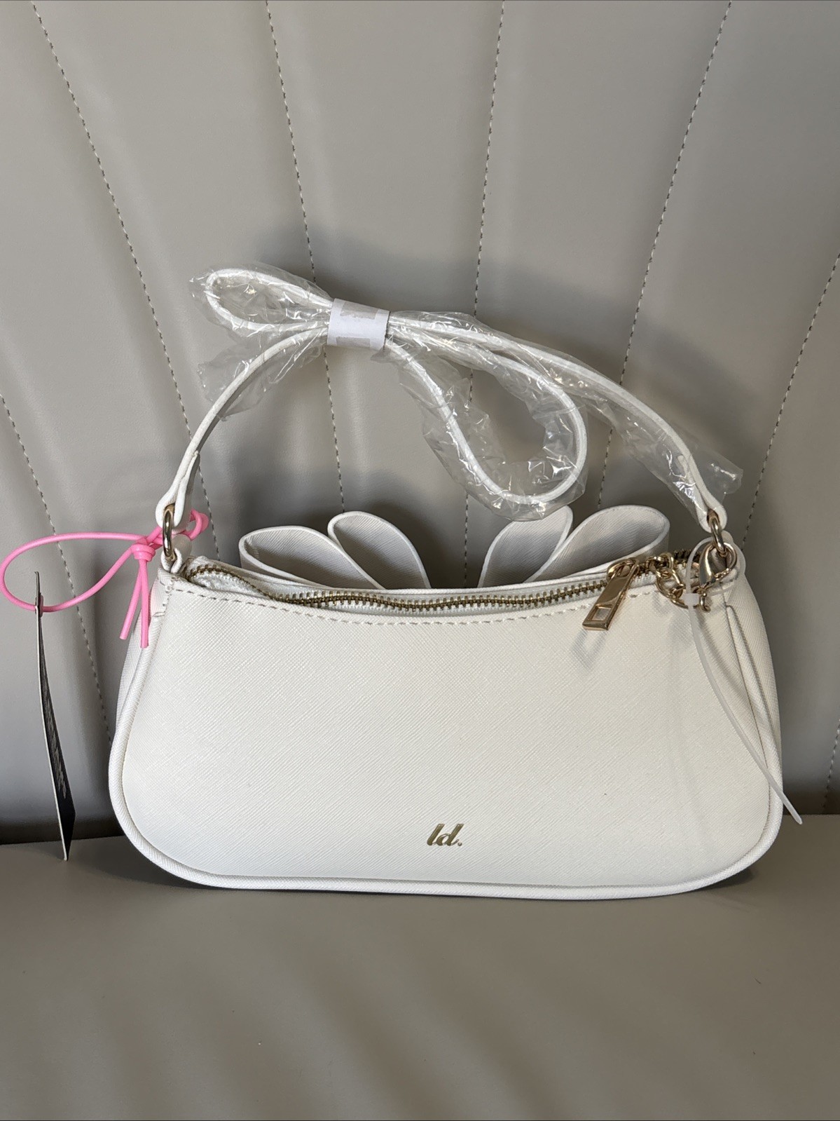 Like Dreams Bowtie Crossbody White Faux Leather Flap Chain Strap Gold Logo