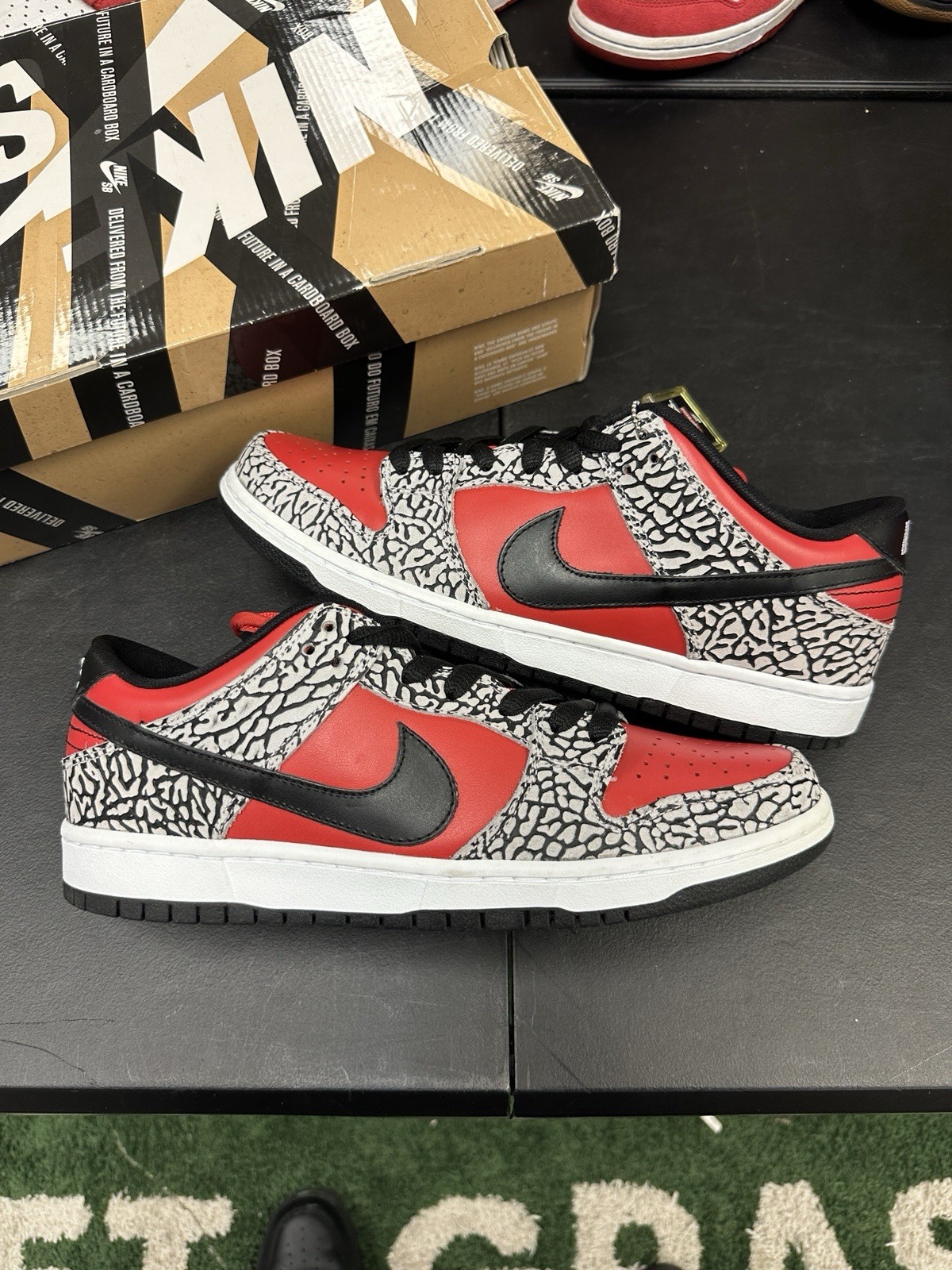 Size 10 – Supreme x Nike Dunk Premium SB Low Red Cement
