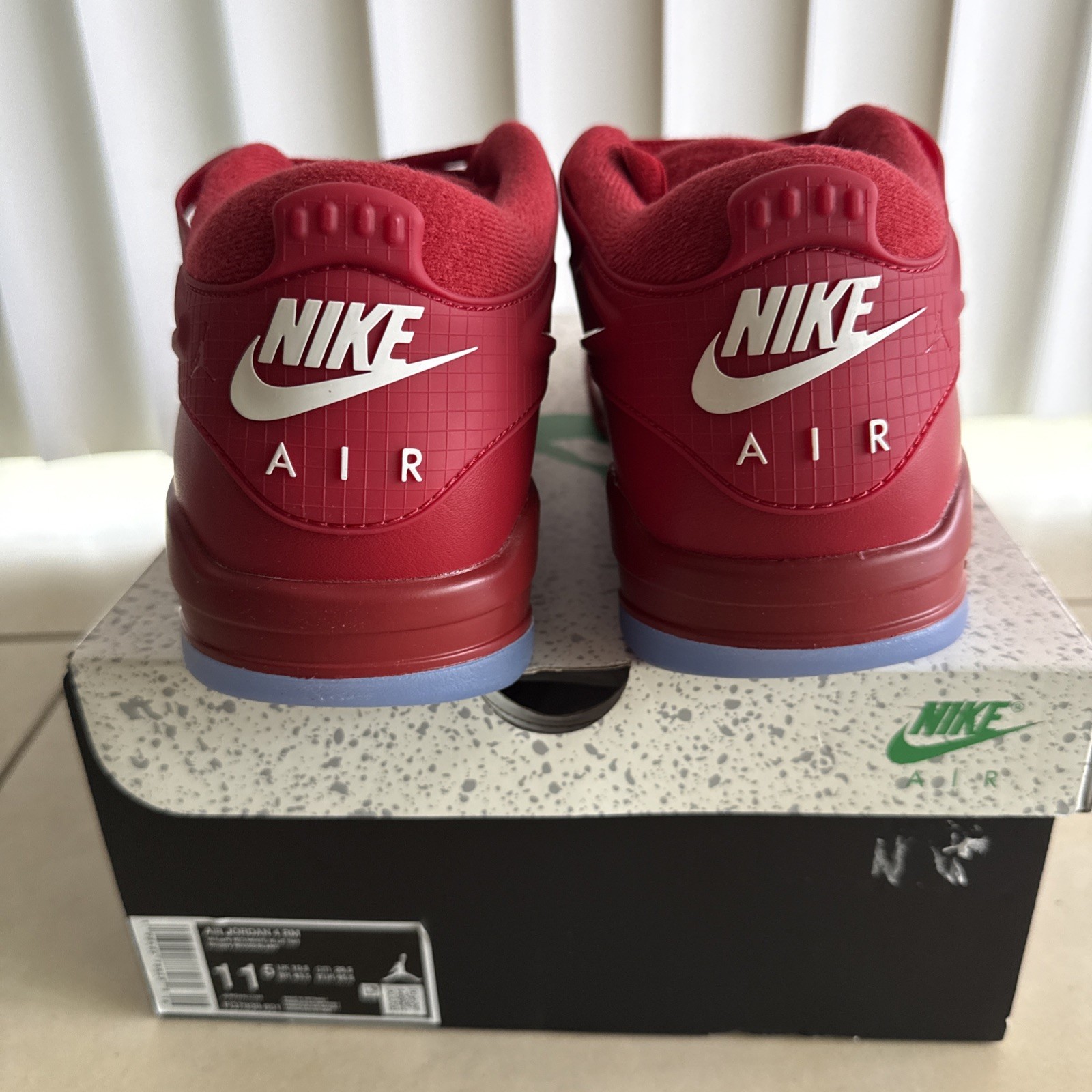 Size 11.5 – Air Jordan 4 RM Varsity Red