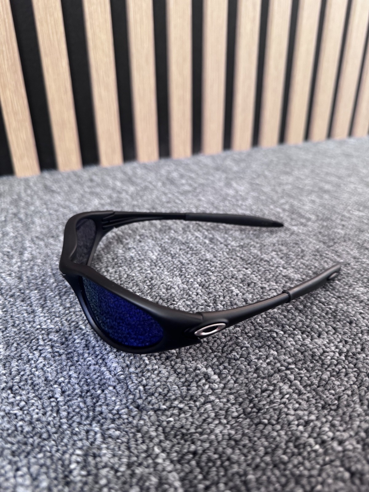 Oakley Minute sunglasses unisex black frame with blue see trough lenses