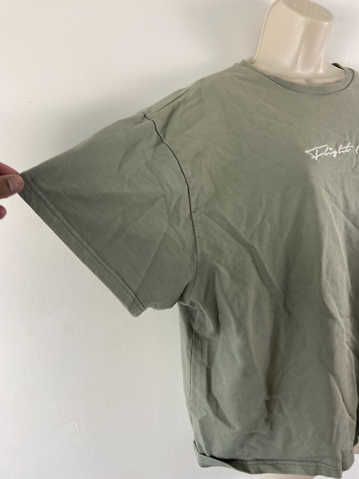 The couture club size Medium grey round neck short sleeve top