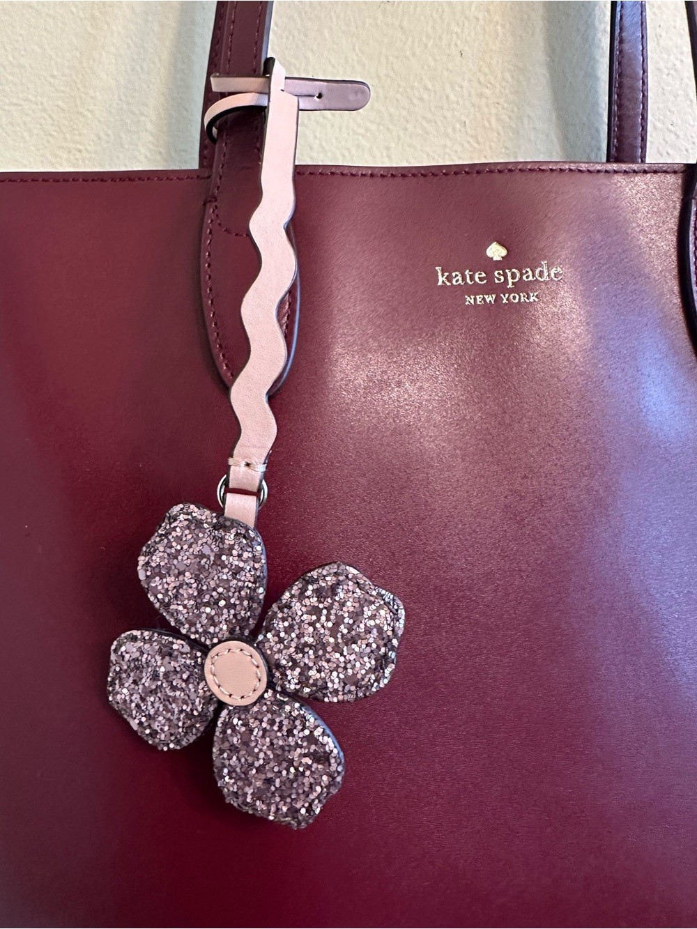 Kate Spade Burgundy Leather Tote with Pink Flower Charm