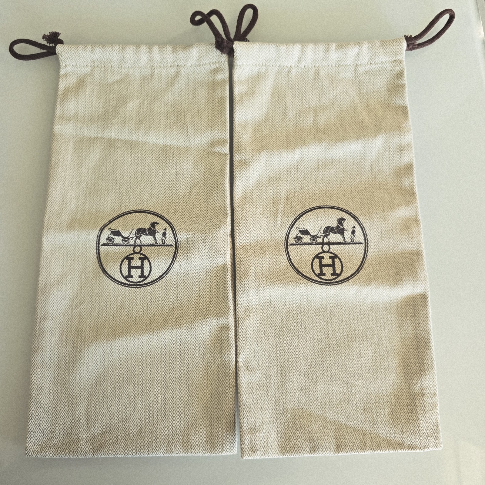 Hermès Set of 2 Beige Drawstring Dustbags with Logo Accent Designer 14×6.25in