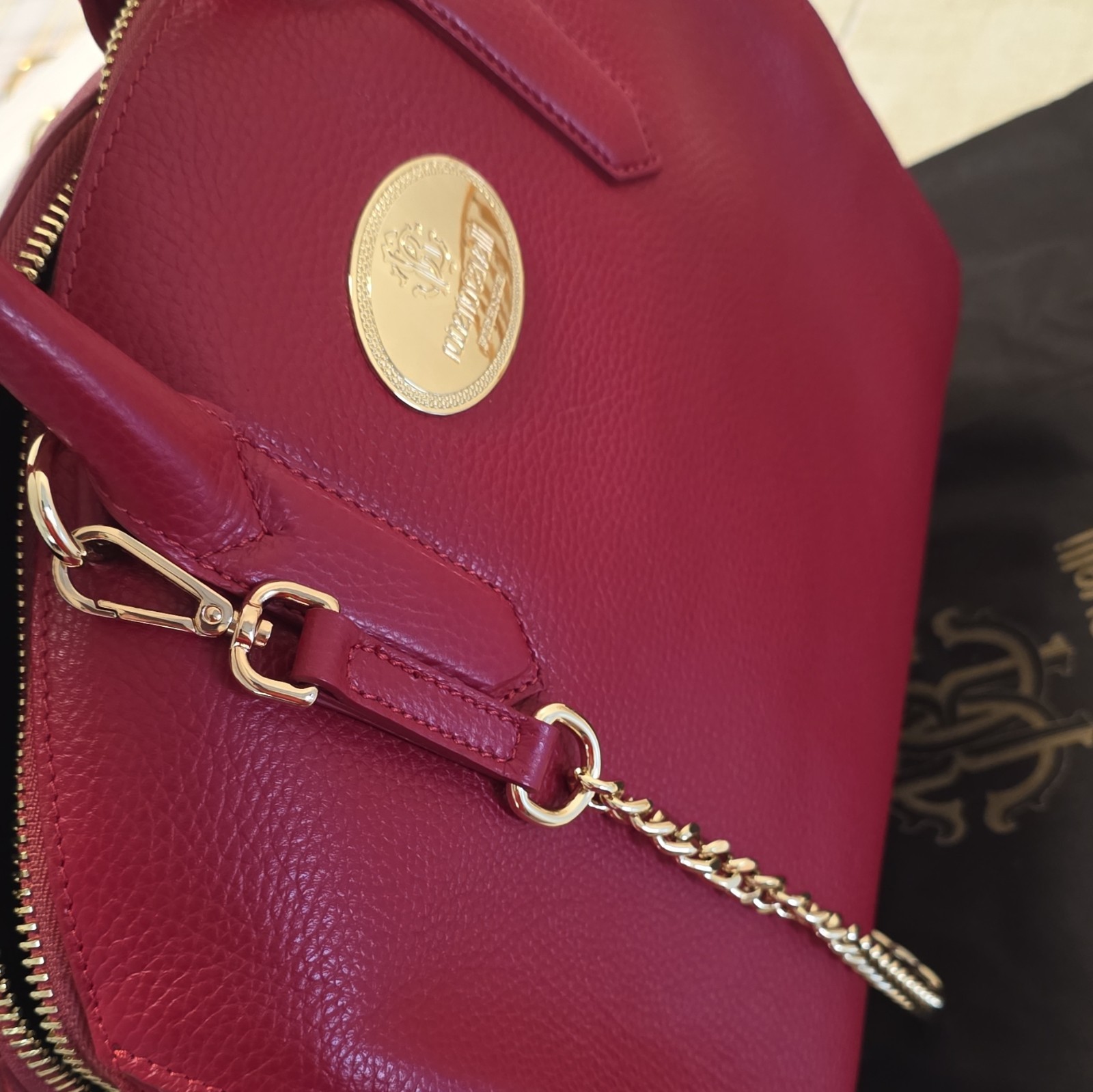 Roberto Cavalli travel bag, red, never used, in its shopping bag.