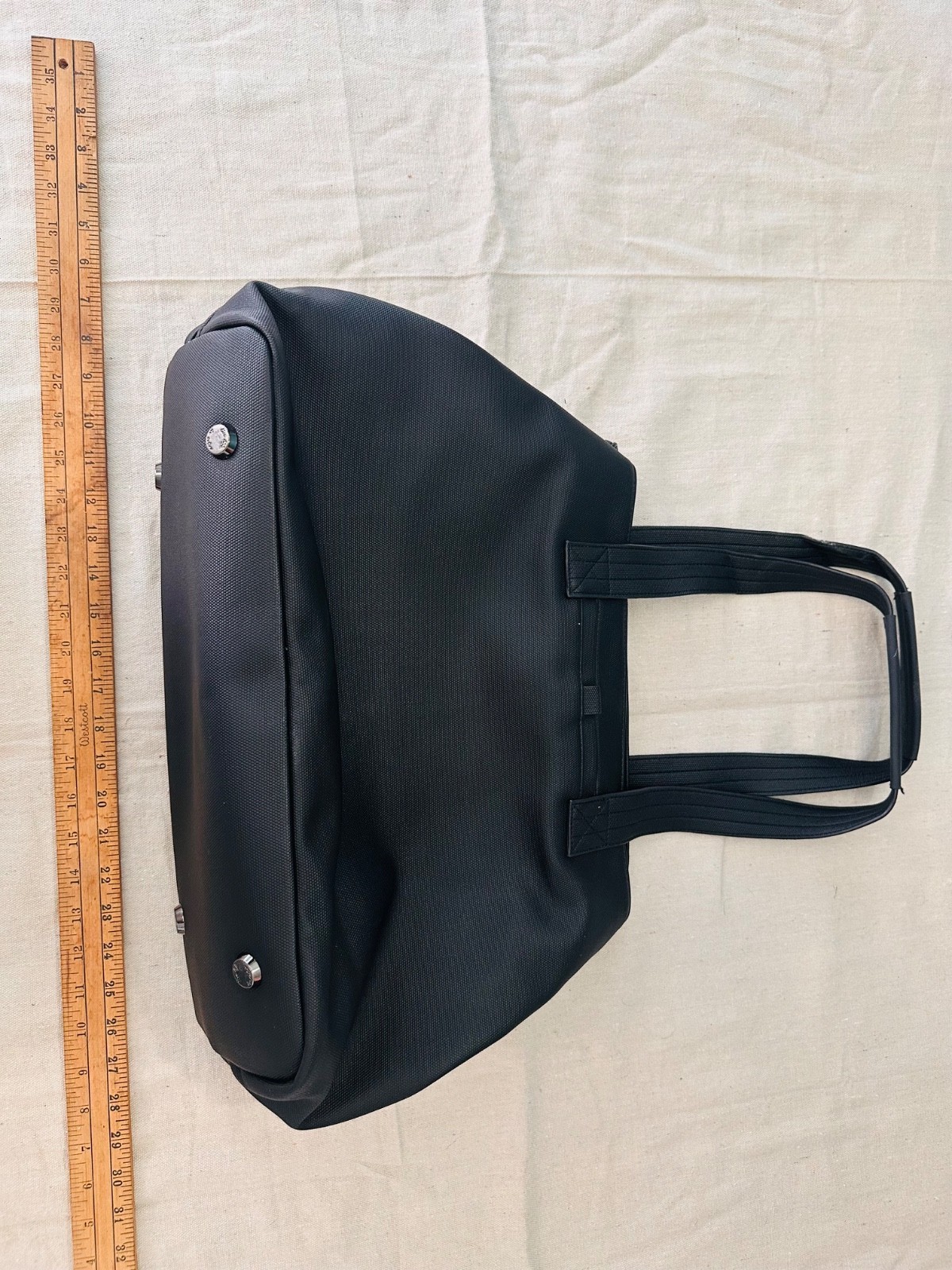 black lug handbag multicolored wavy stitching. Multi functional / very spacious