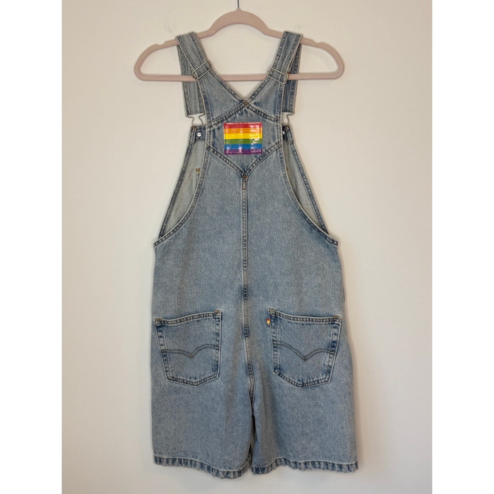 Levi’s Pride Liberation Shortalls Overall Shorts in a light acid wash