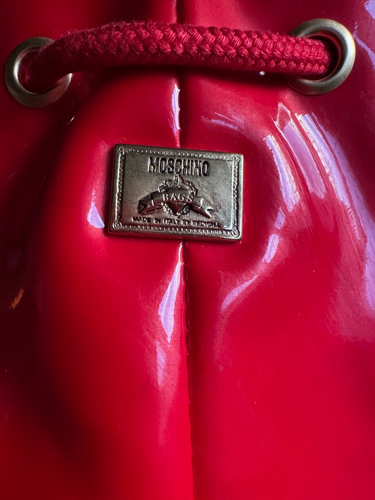 PRE-OWNED MOSCHINO BUCKET HANDBAG MADE IN ITALY BY REDWALL COLOR RED PVC PATENT
