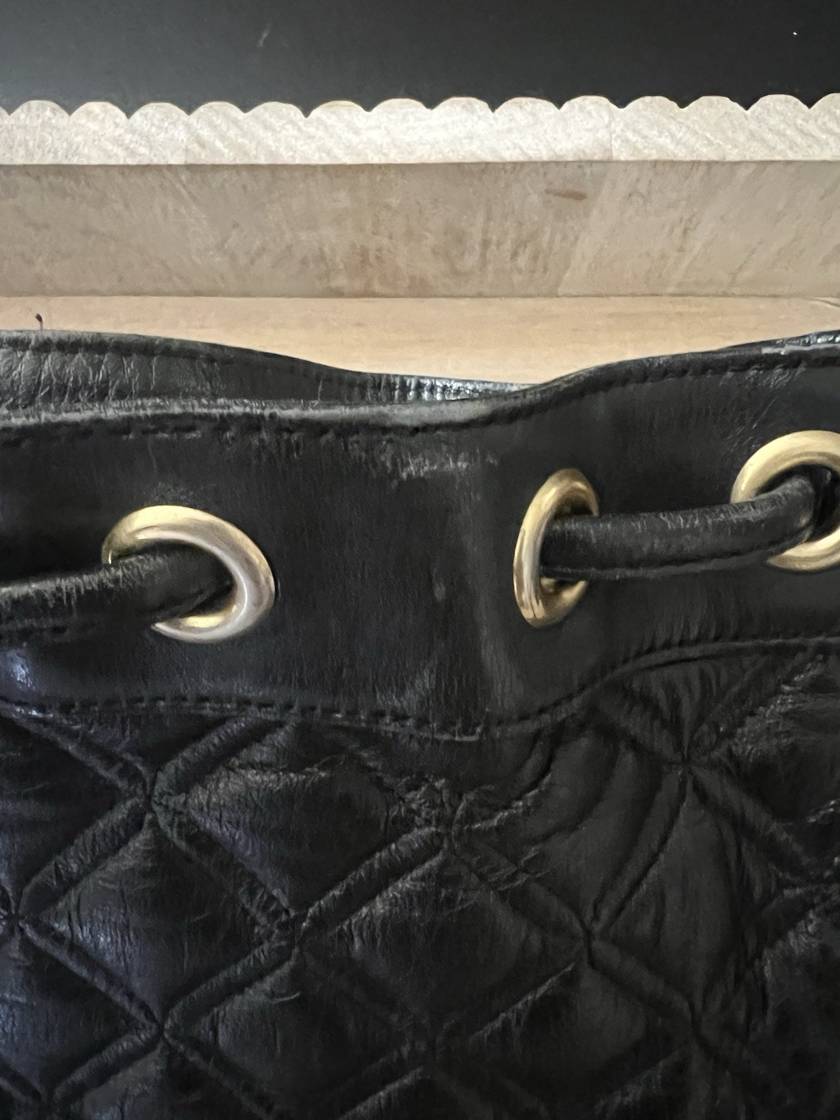 MCM Black Quilted Drawstring Bucket Shoulder Bag Tassel Logo Gold Hardware