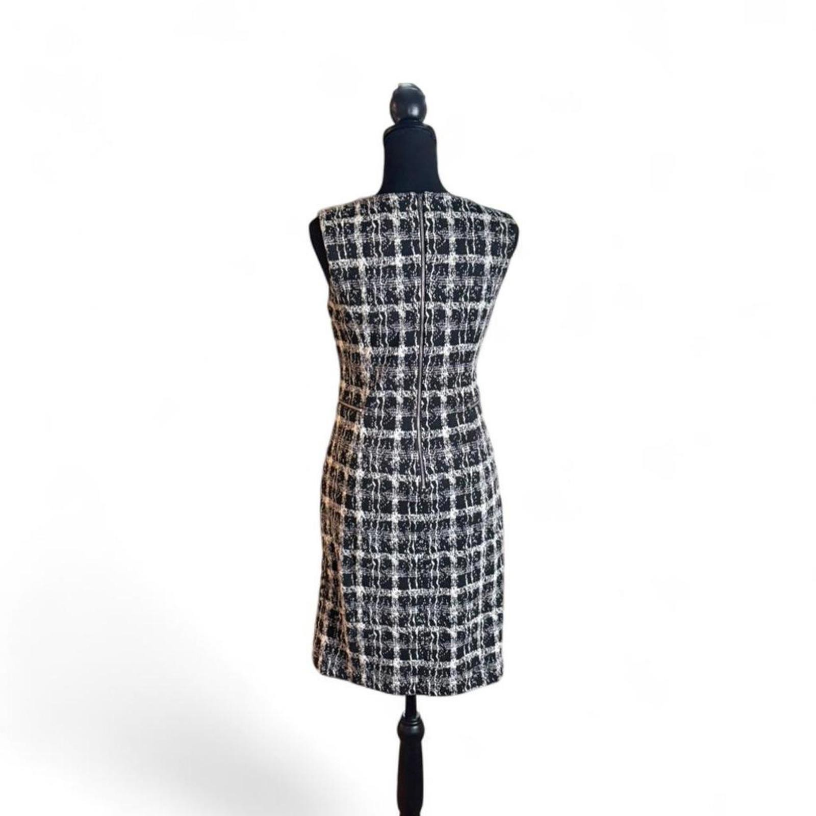 Calvin Klein form fitting dress, stretchy fabric lined size small