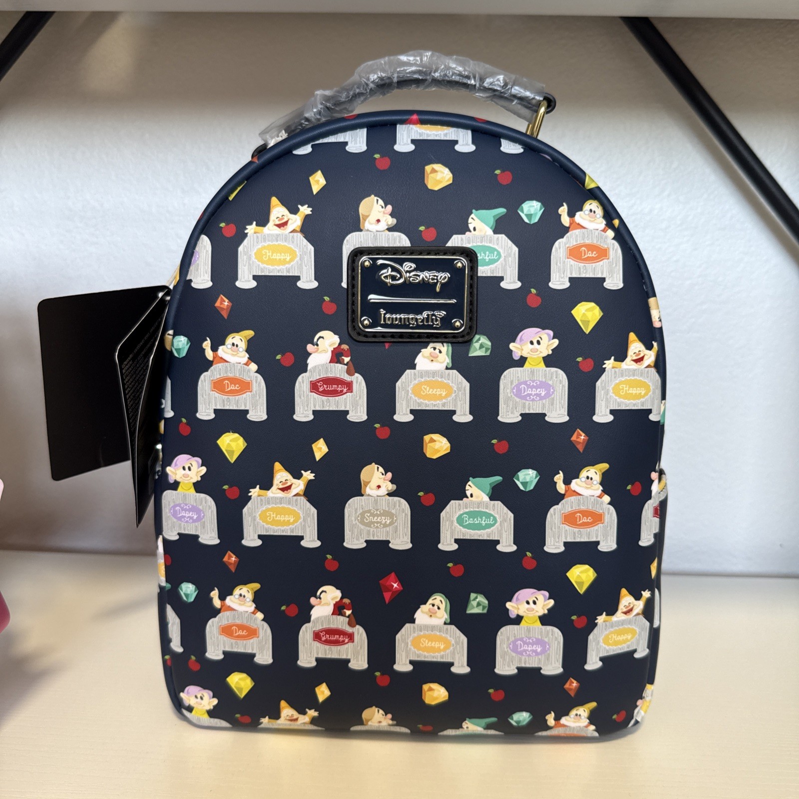 NWT Loungefly Disney Snow White and Seven Dwarves Beds Allover Print Backpack