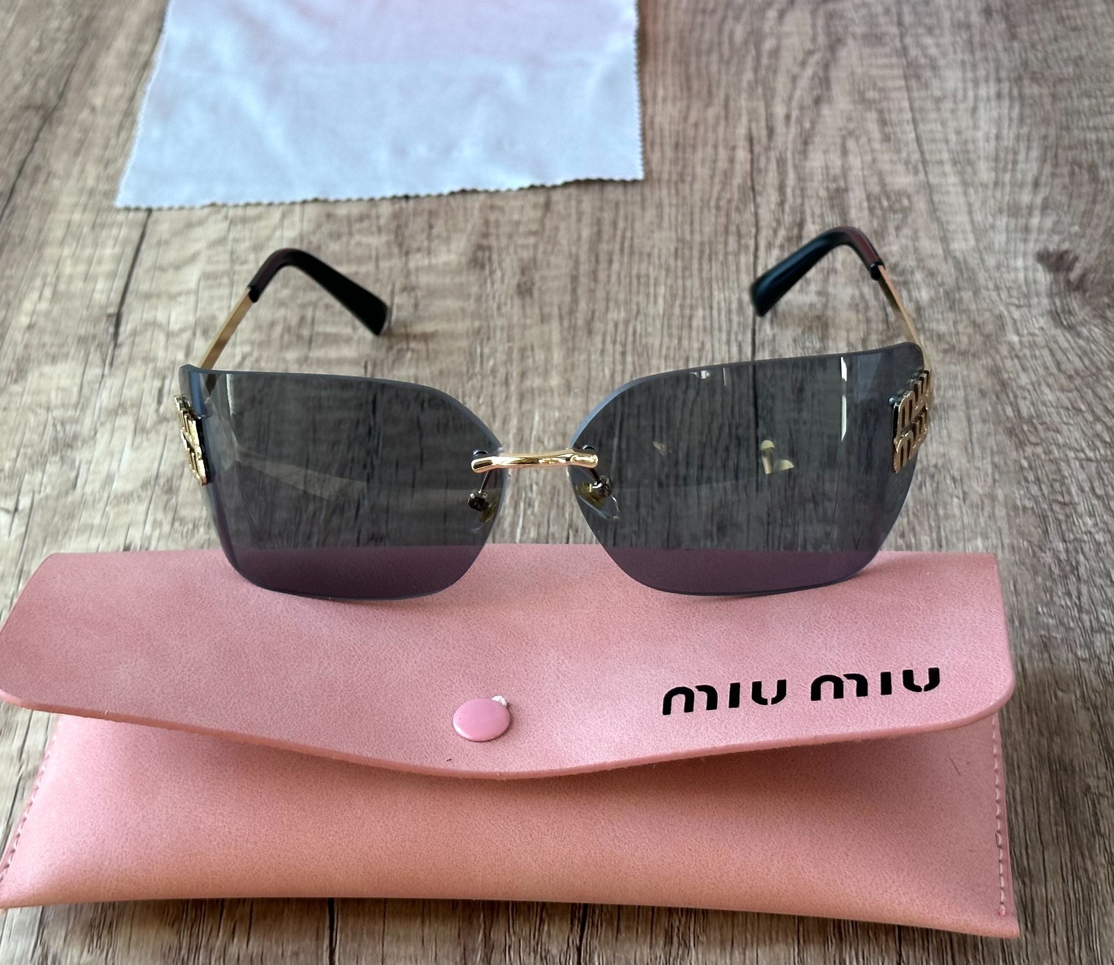 MIU MIU SUNGLASSES BLACK GRAY 100% AUTHENTIC WITH ORIGINAL PACKAGE SHIELD