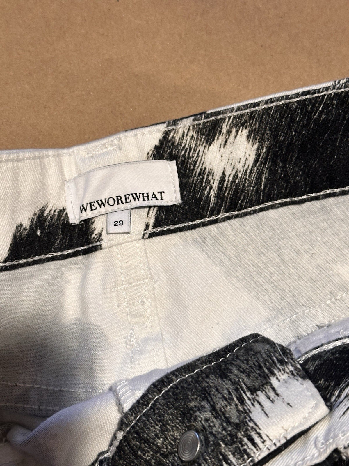 WeWoreWhat Cow Print Stiletto Flare Jeans NWT Size 29 Western Cowgirl Rodeo