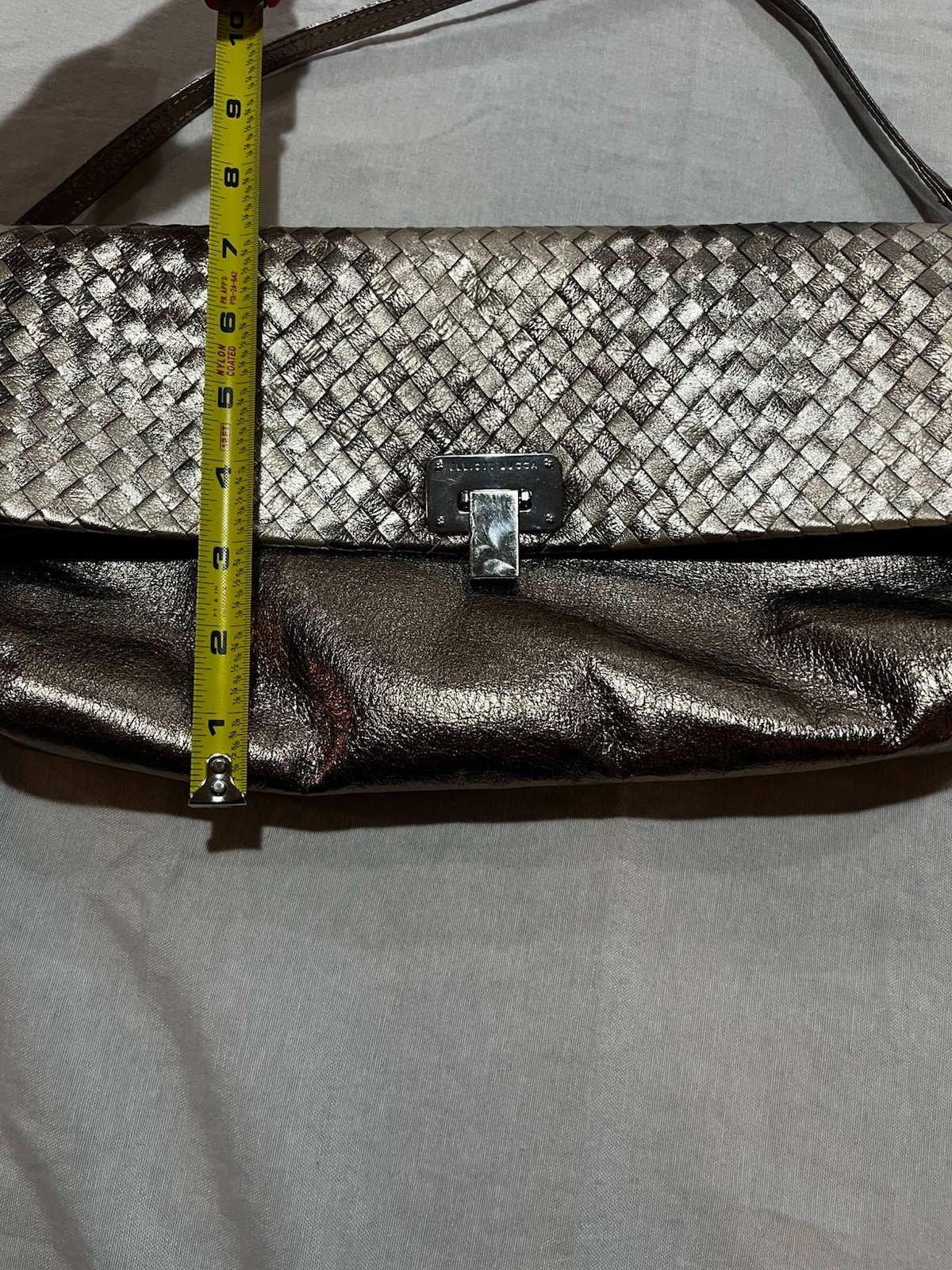 Elliott Lucca metallic woven leather convertible clutch/crossbody bag.