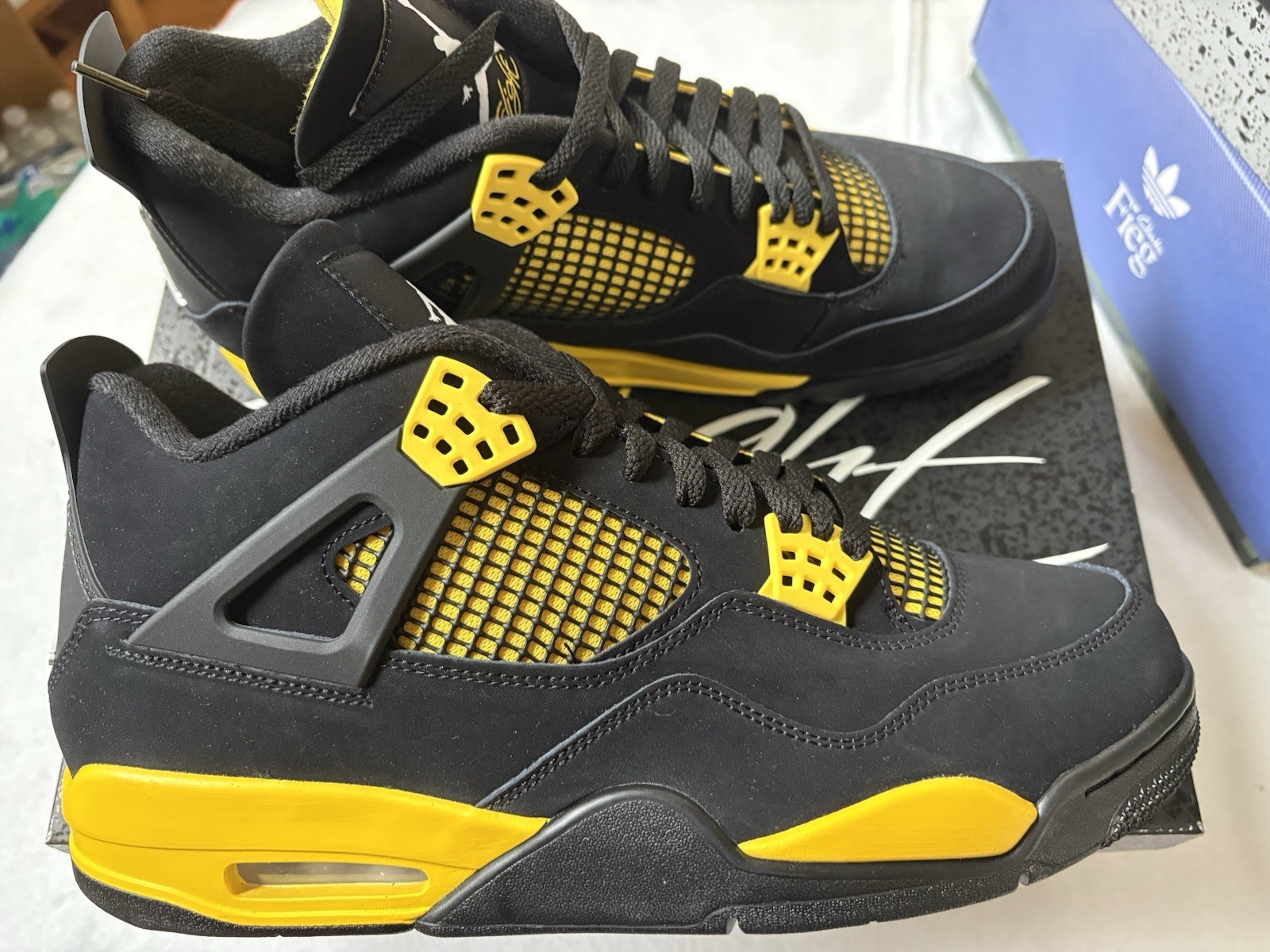 Size 11.5 – Jordan 4 Retro Mid Thunder