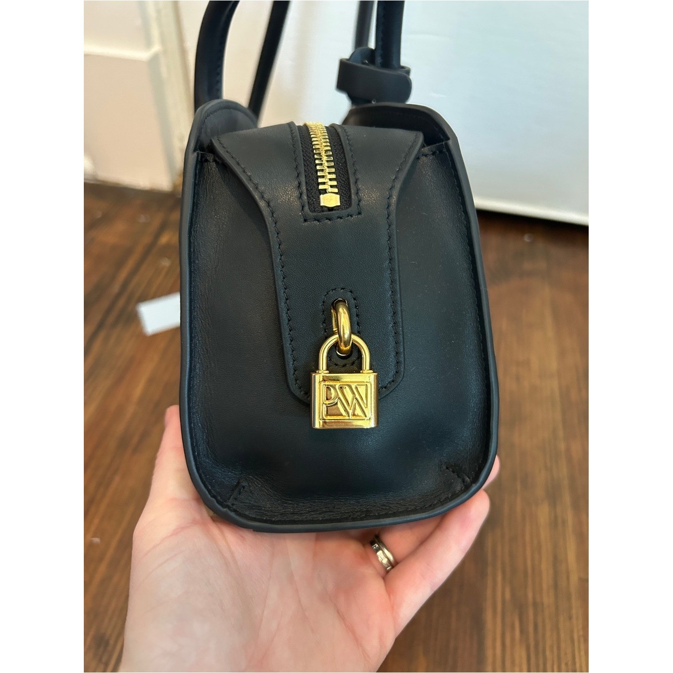 Parisa Wang Gabrielle East-West Shoulder Bag Black Gold Zip and Padlock Accent